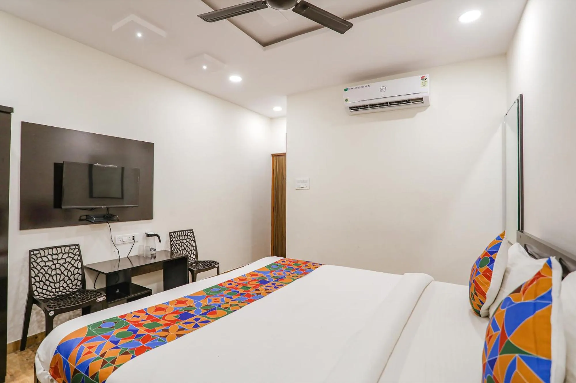 Bed in FabHotel Royal Stay - Beltarodi