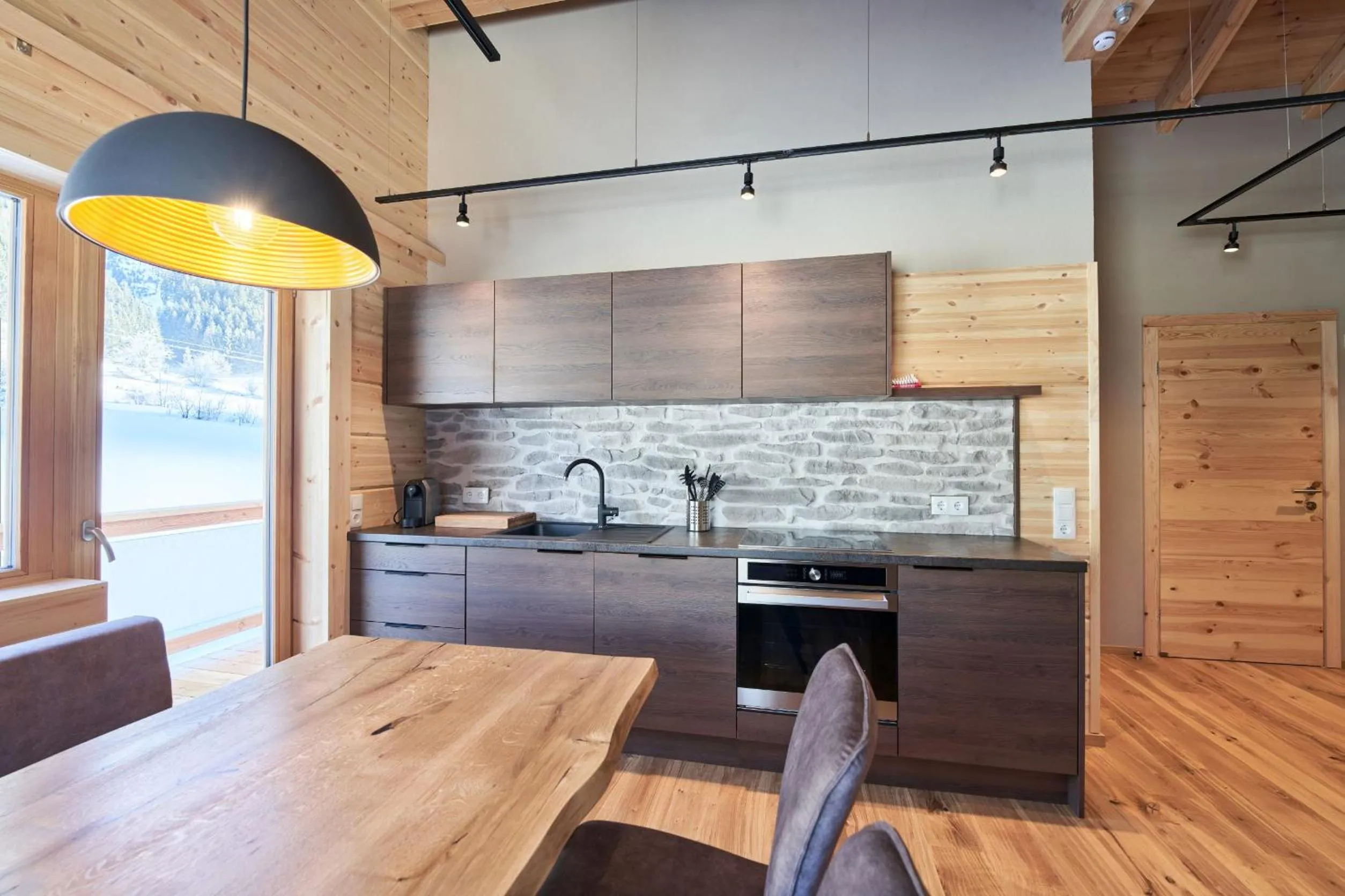 Kitchen or kitchenette in Xeis Natur Apartments
