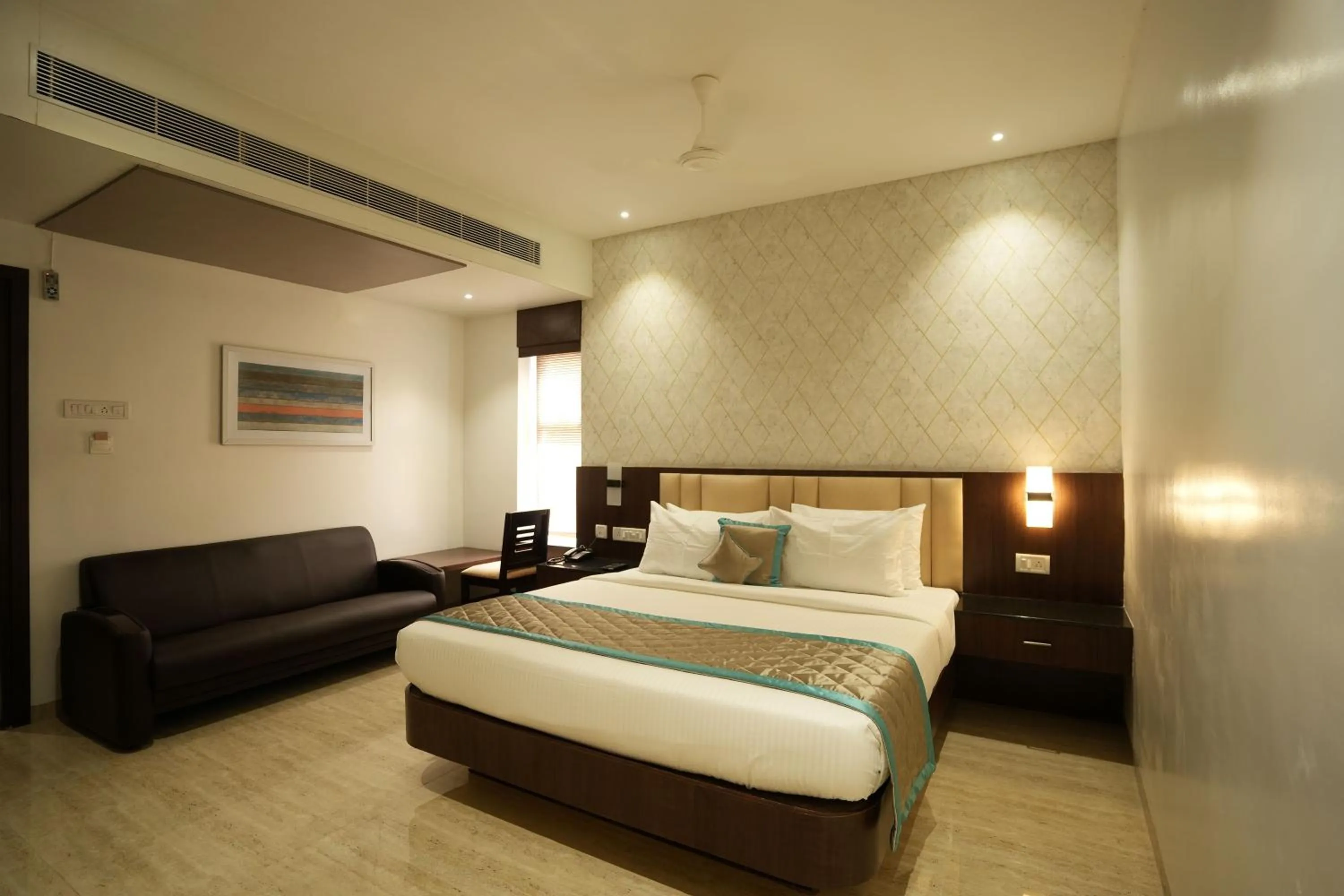Photo of the whole room, Bed in Sri Ambal Grand