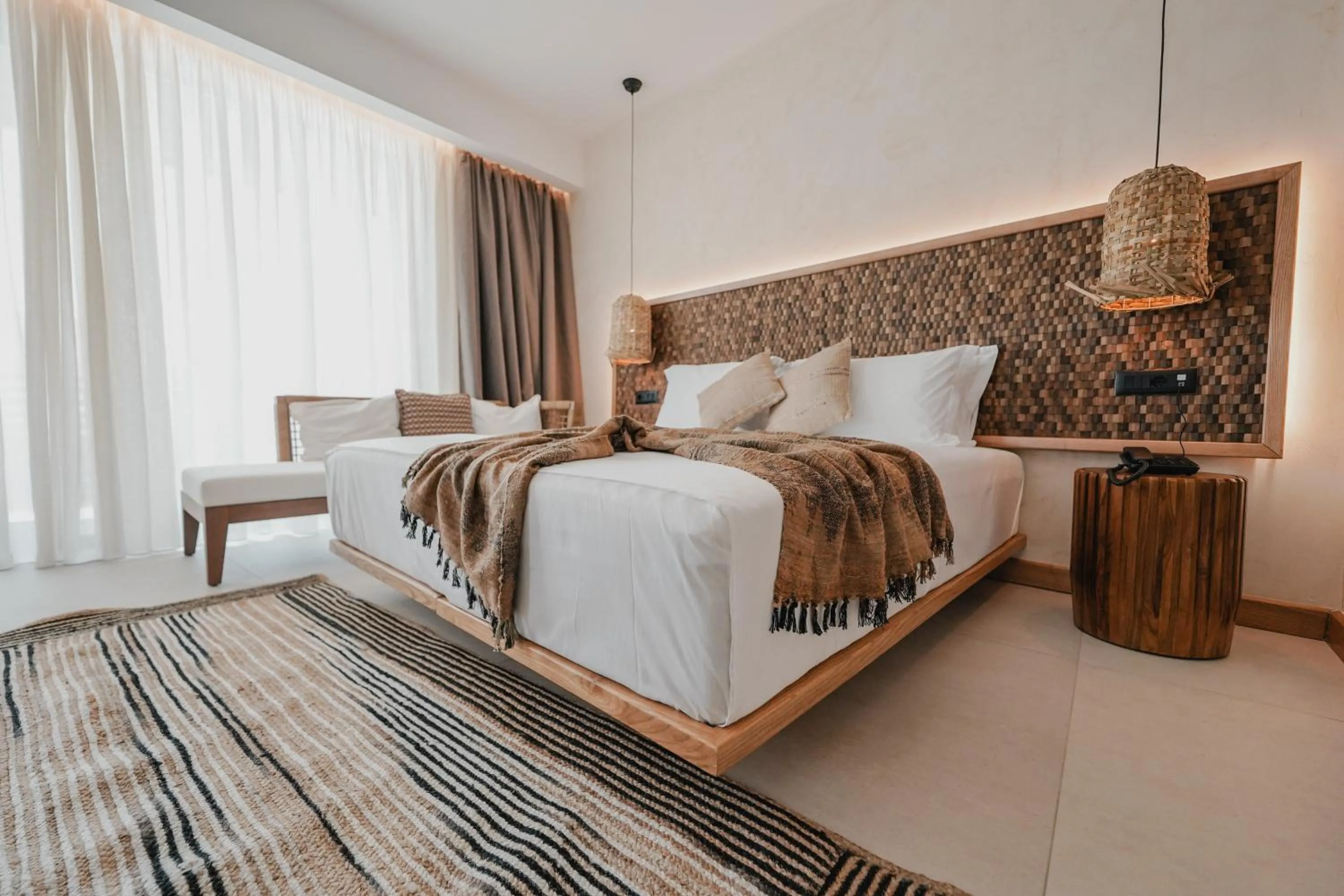 Seating area, Bed in Lost Seaside Hotel
