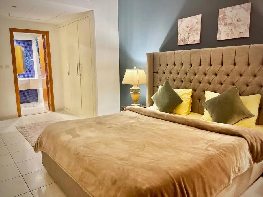 Bed in Chic 3 bedroom apartment