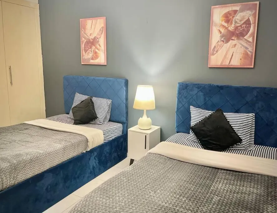 Bed in Chic 3 bedroom apartment