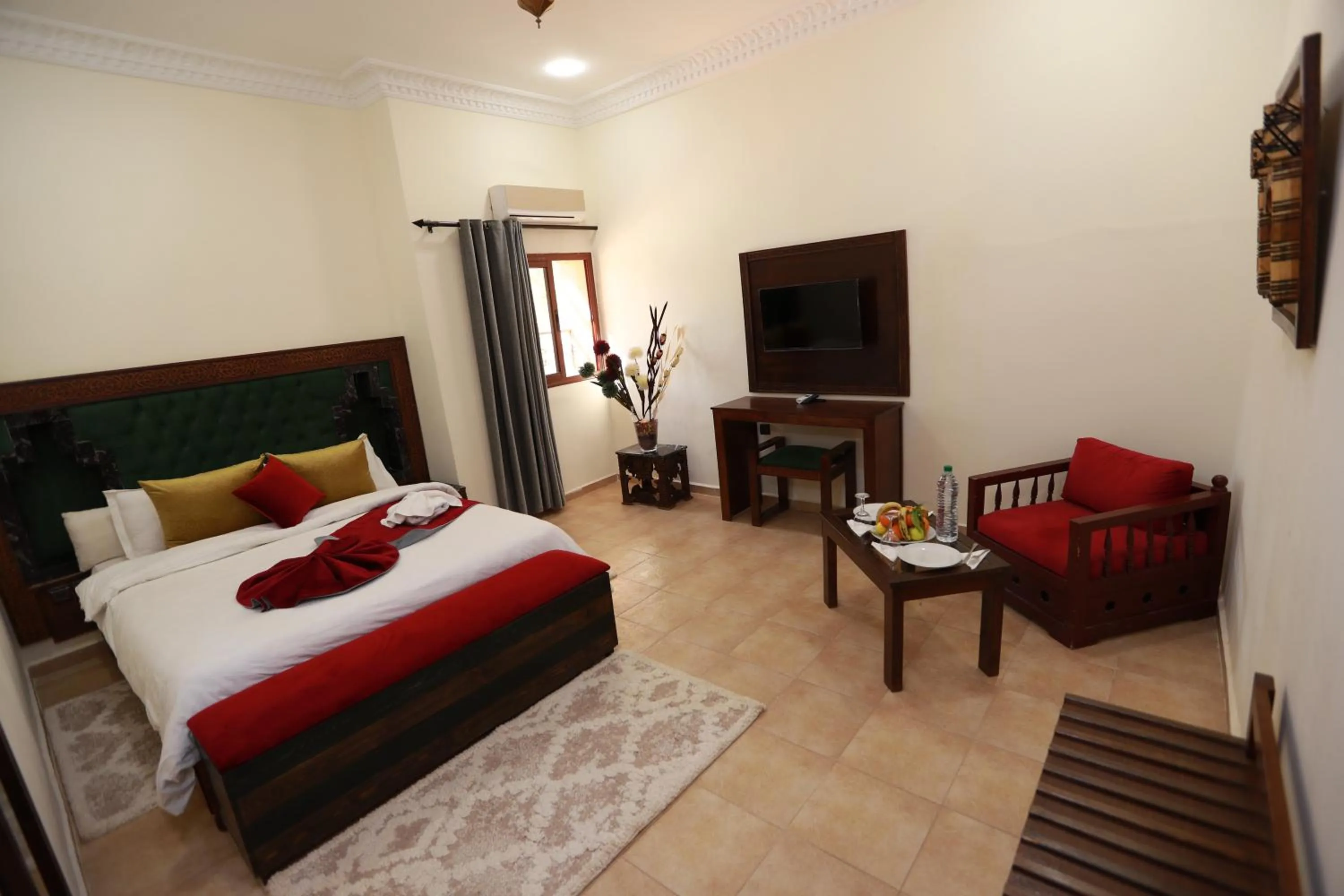 Seating area, Bed in Kasbah Tizimi