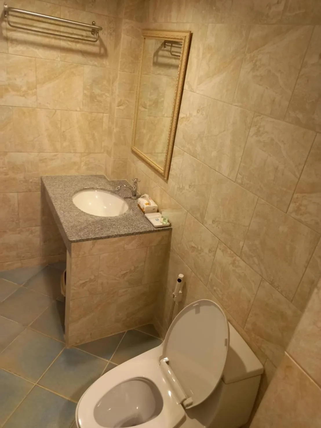 Toilet in Valentier Cafe and Hotel