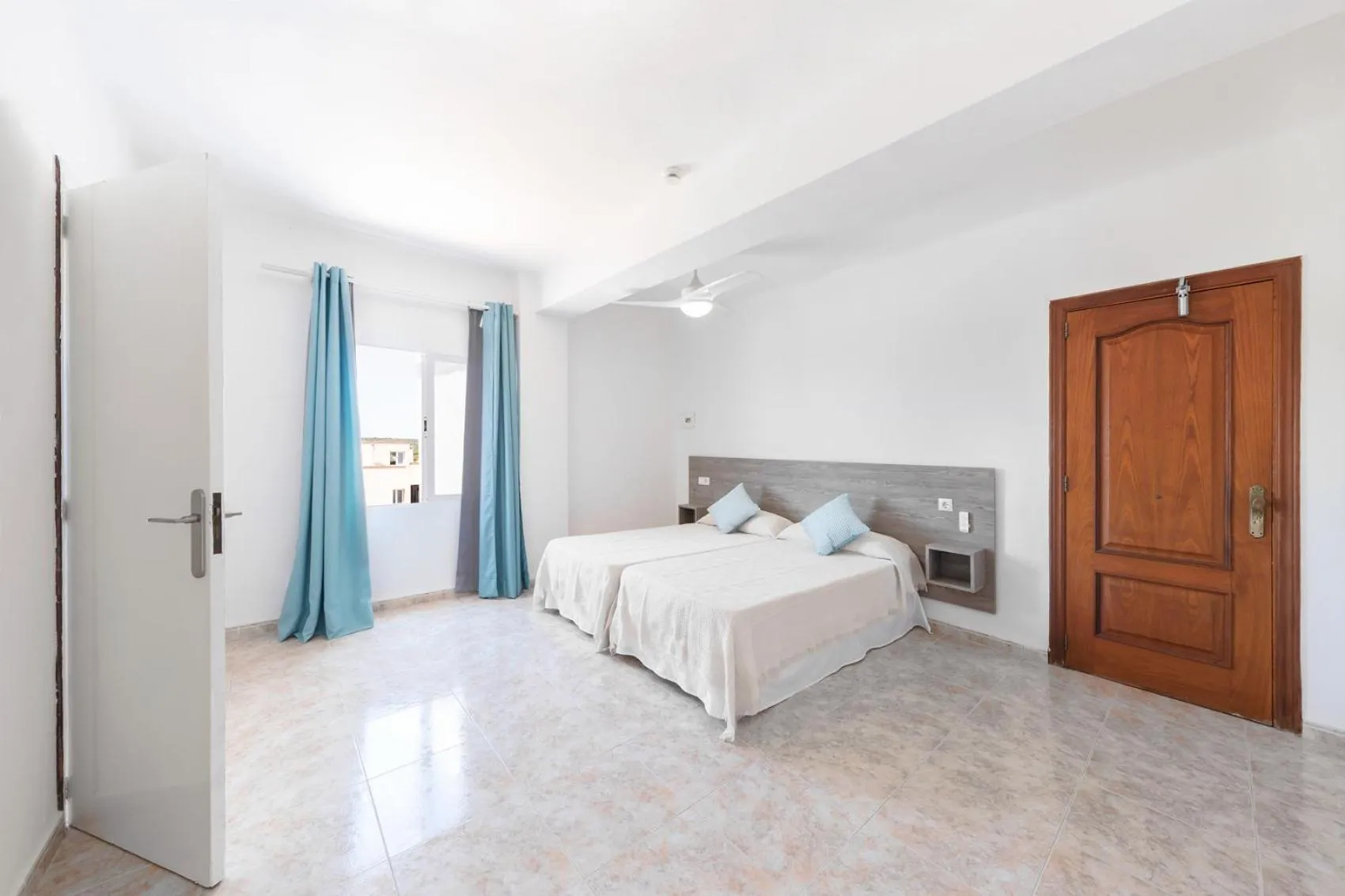 Bed in Hostal Cala Llombards