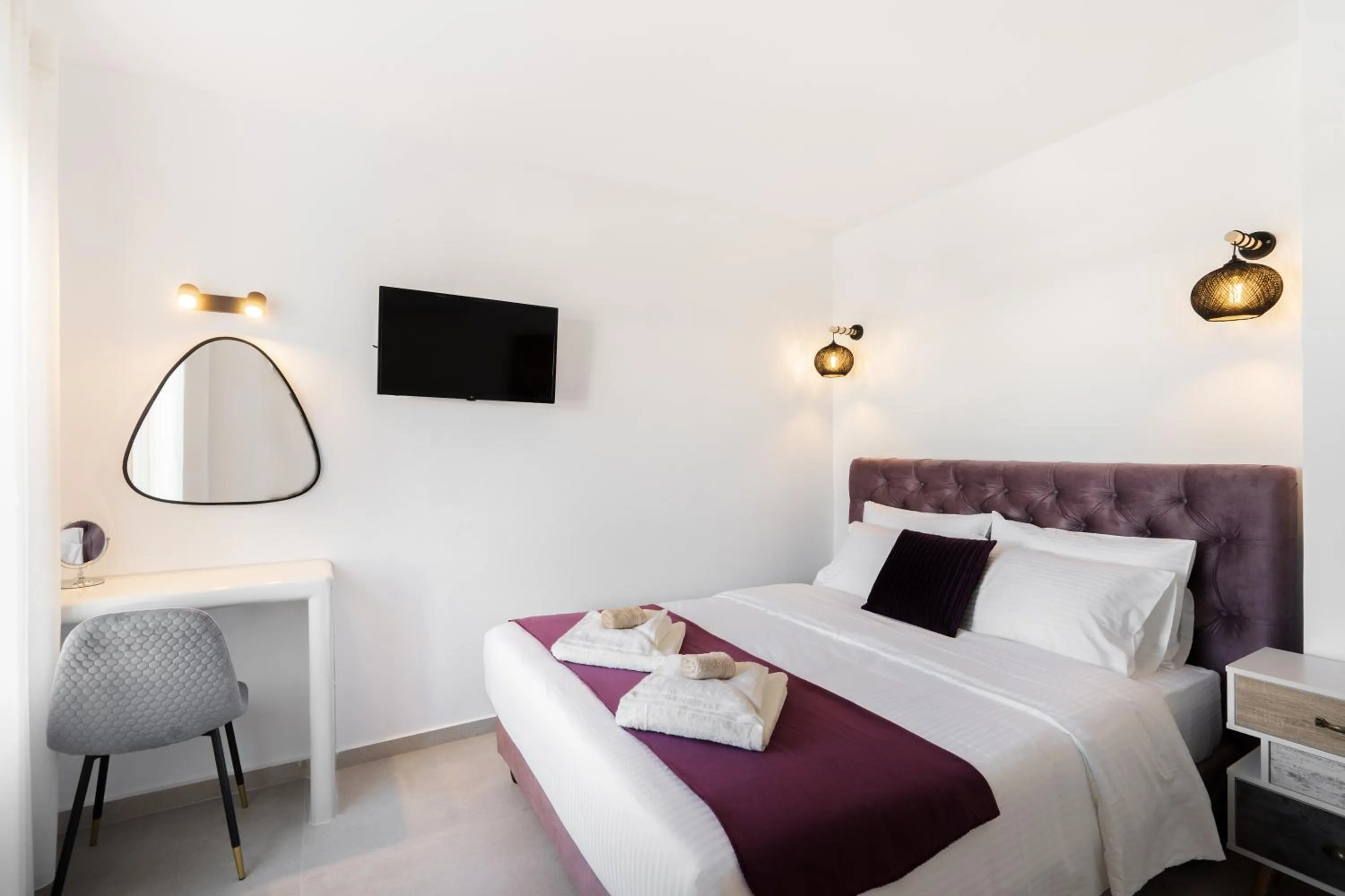 Bed in SN Santorini Apartments