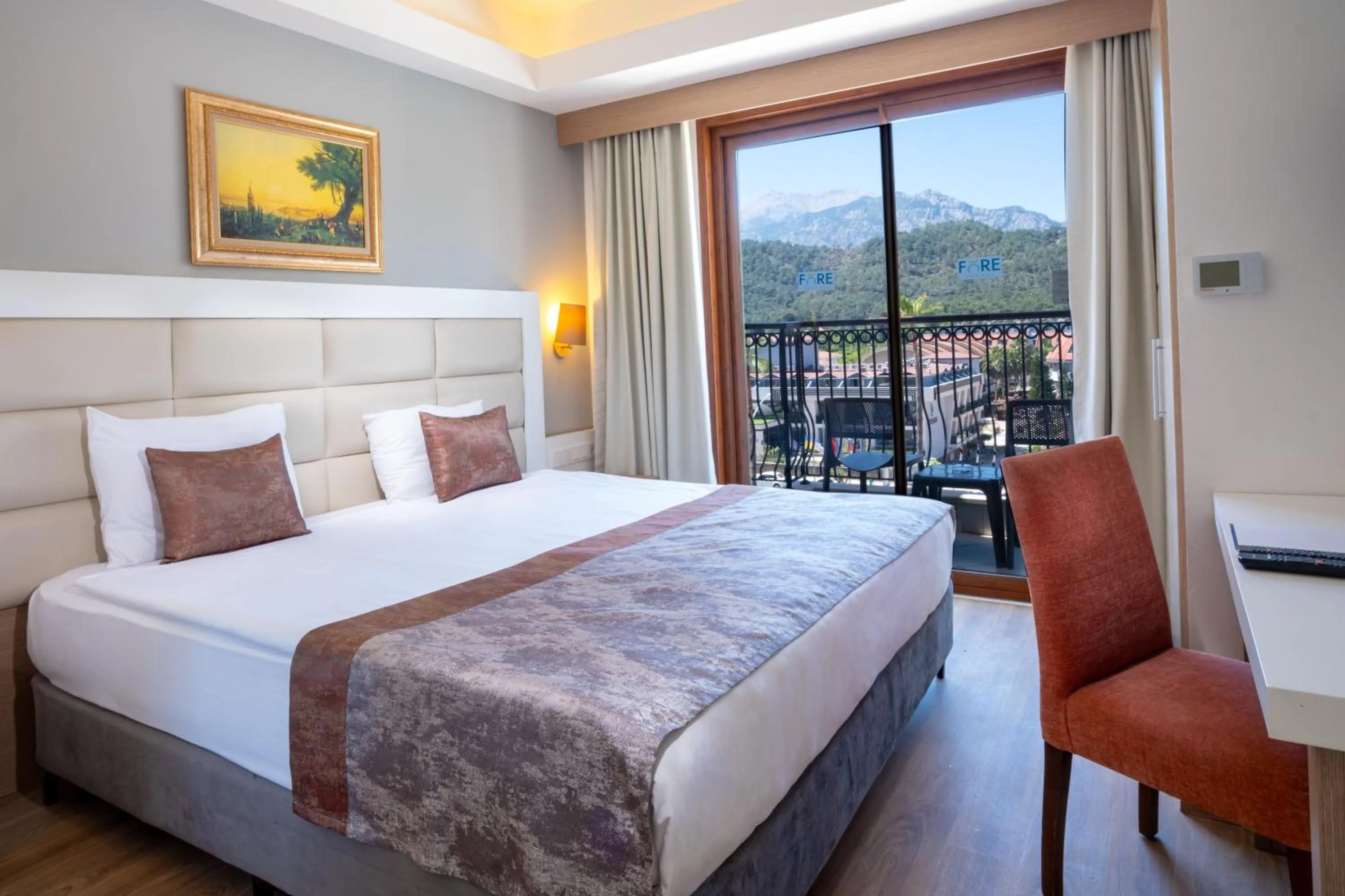 Bed in FORE RESORT & SPA