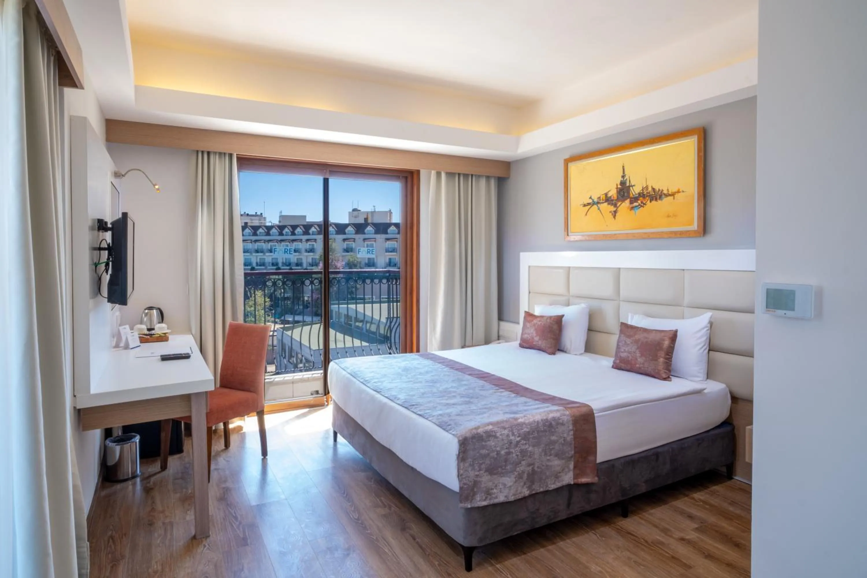 Bed in FORE RESORT & SPA