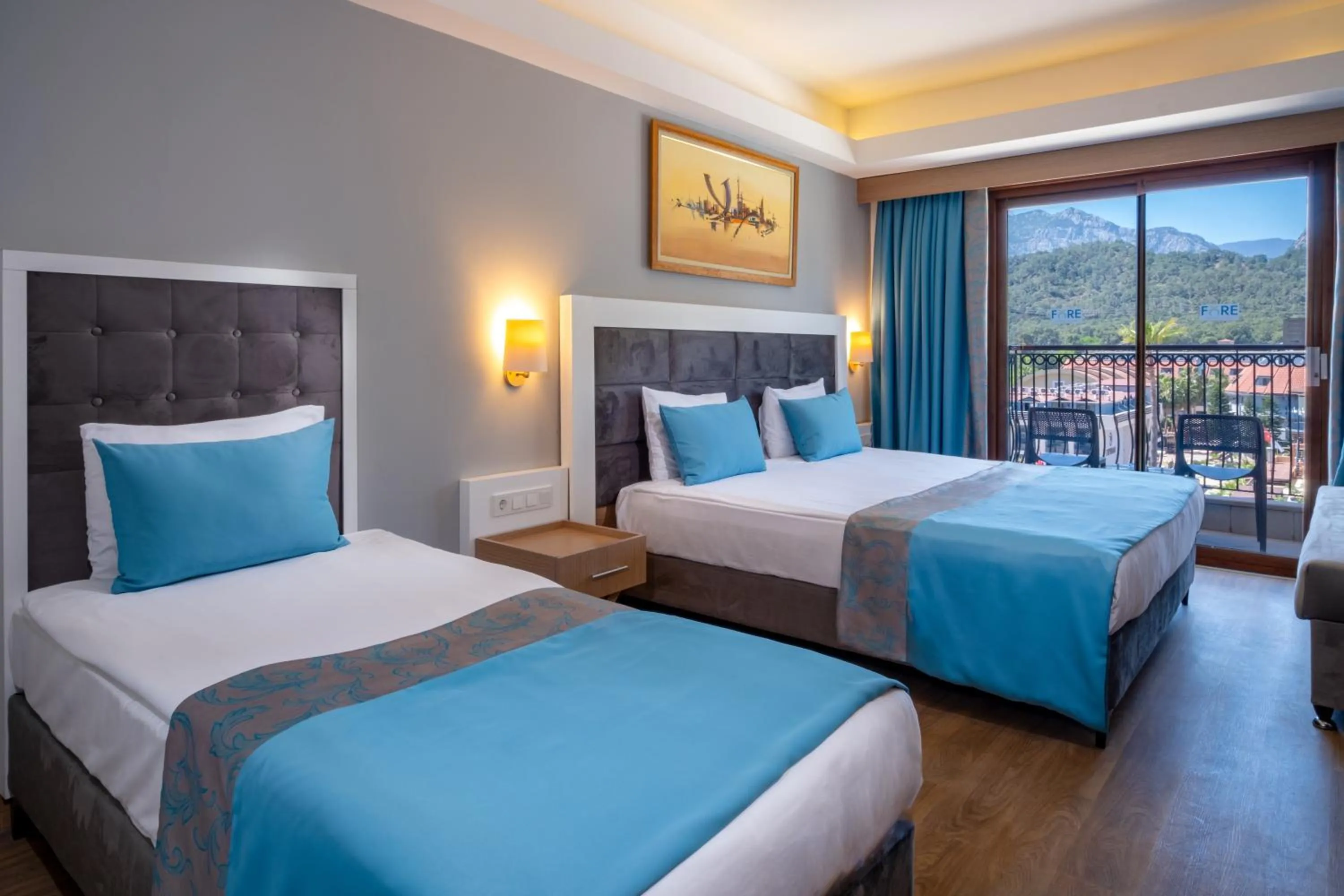 Bed in FORE RESORT & SPA