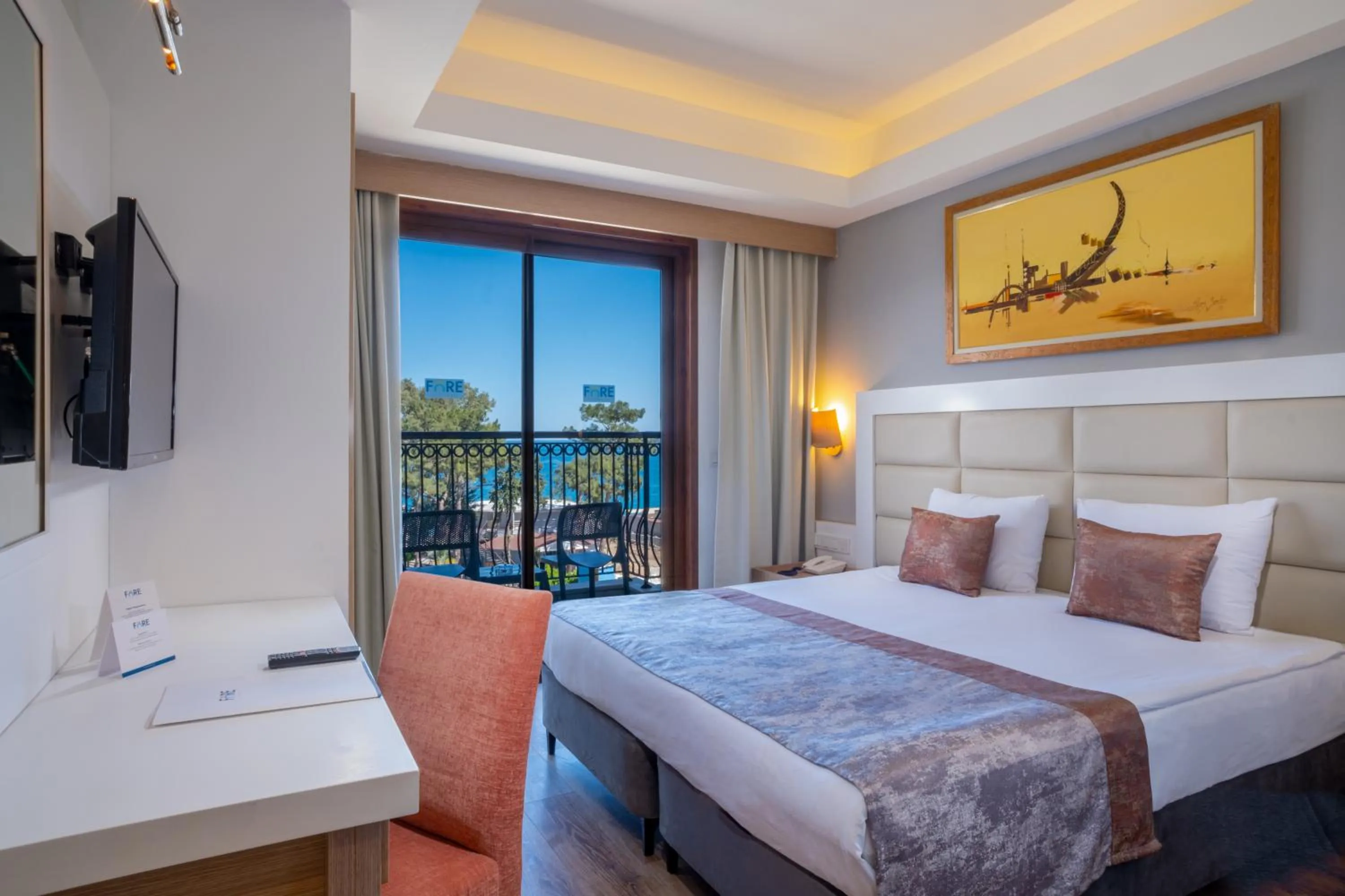 Bed in FORE RESORT & SPA