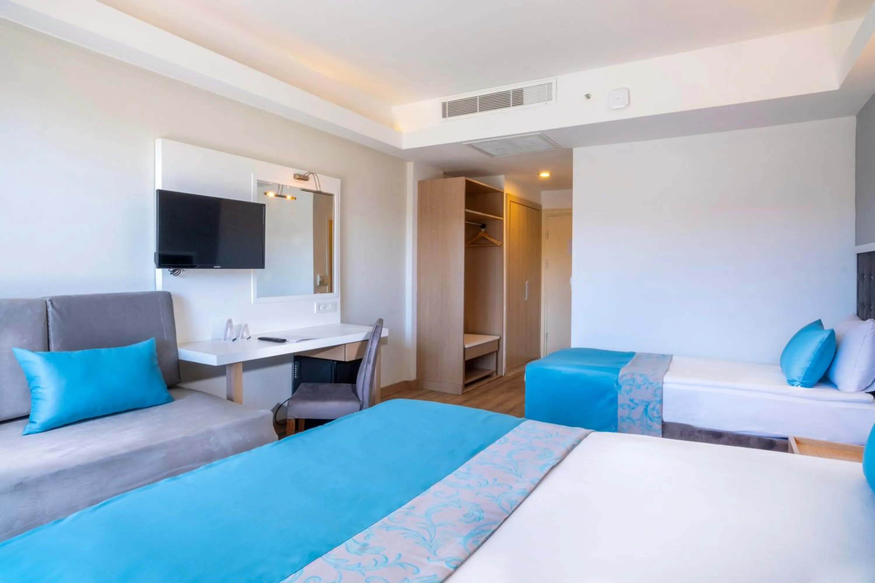 Bed in FORE RESORT & SPA