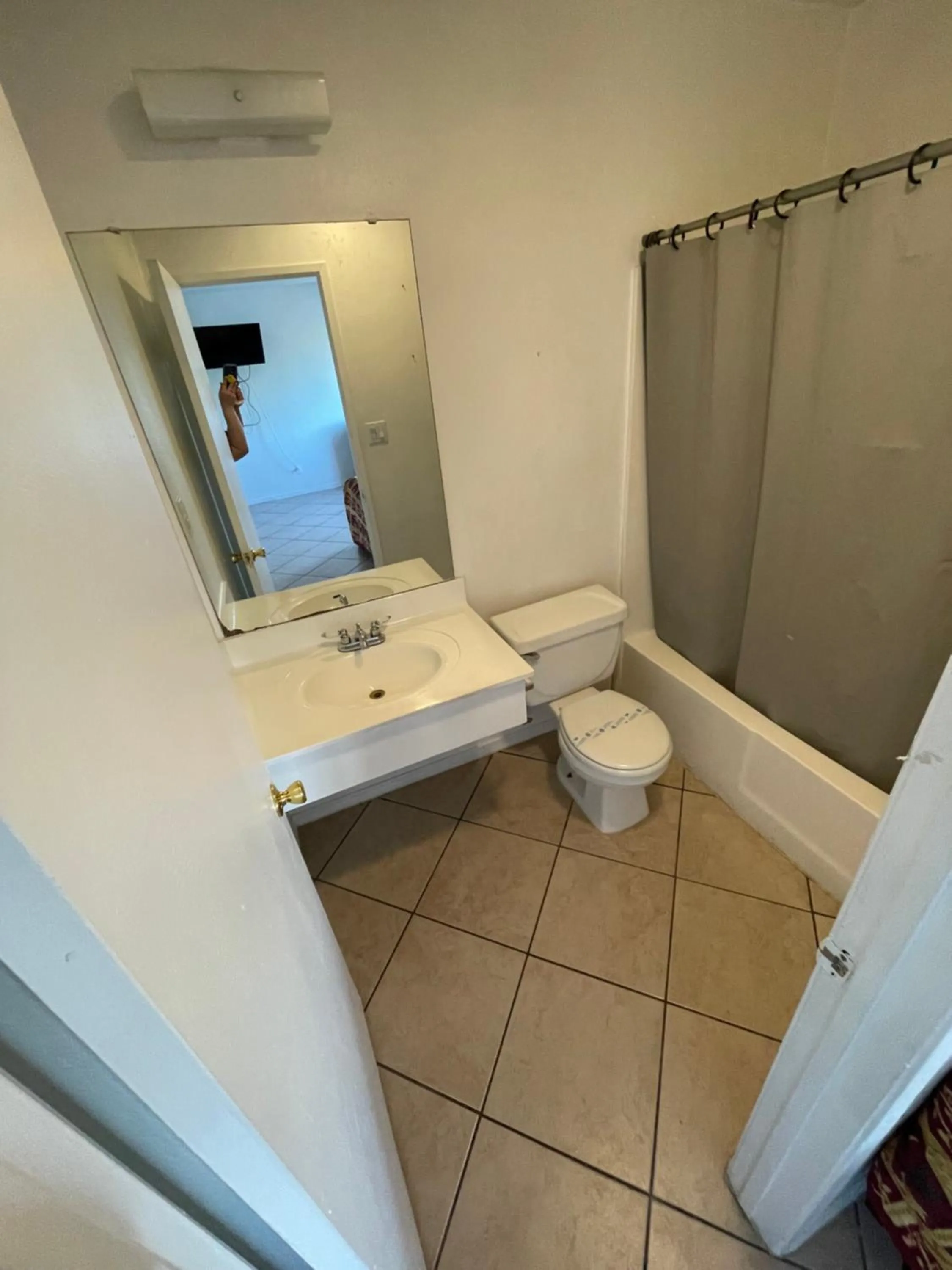 Bathroom in Crown Inn & Suites