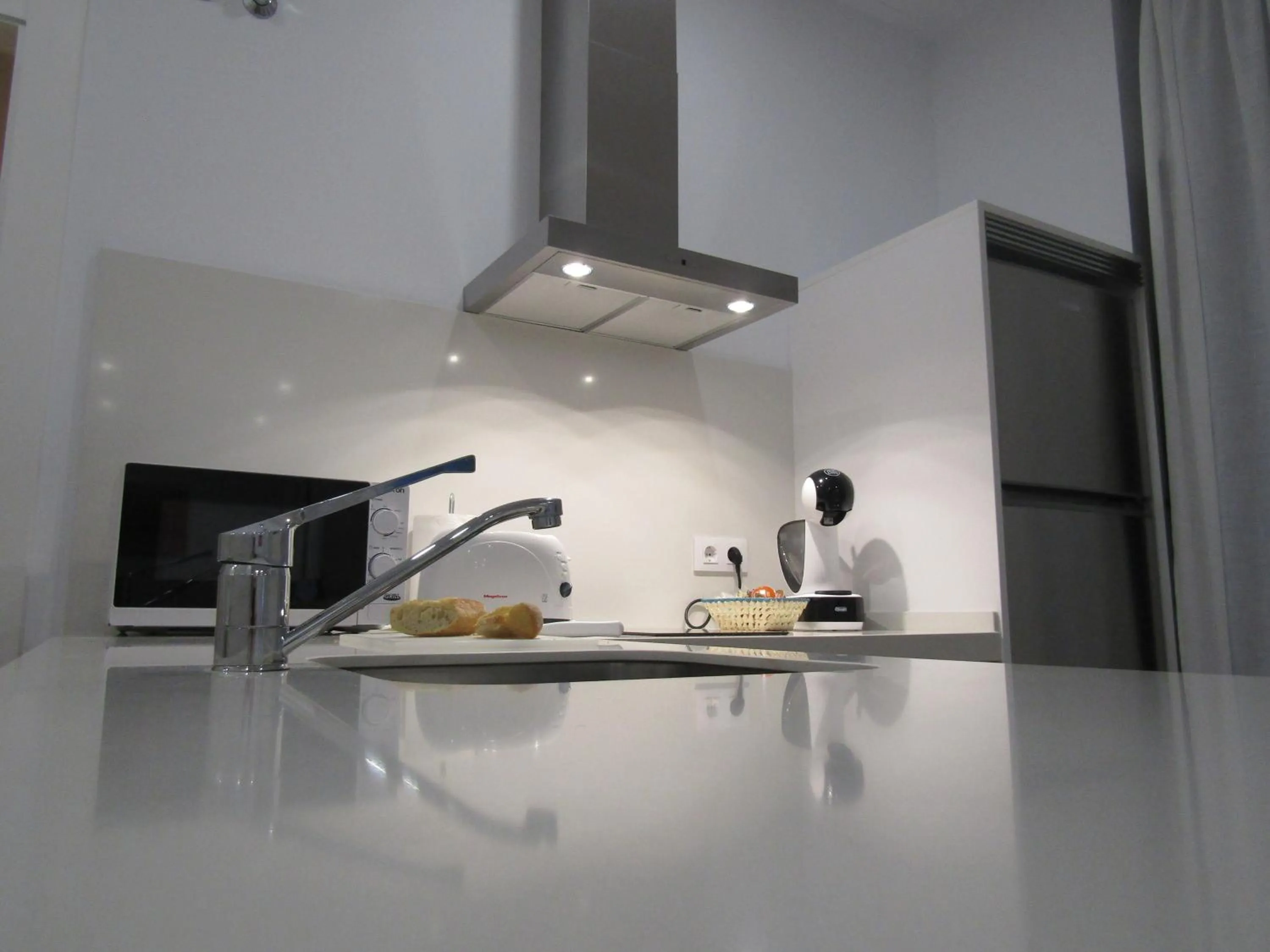 Kitchen or kitchenette in Apartamentos Santa María 15