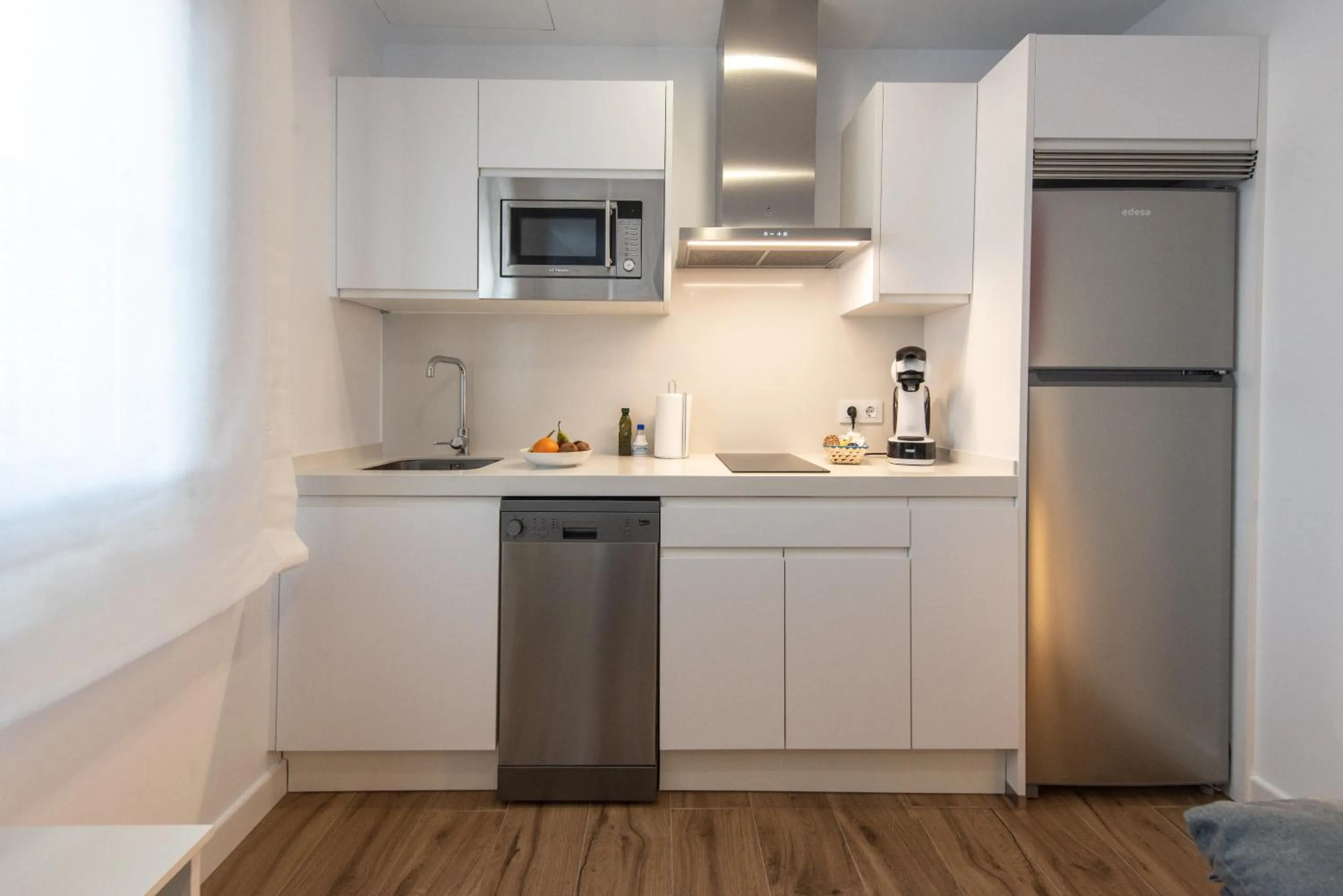 Kitchen or kitchenette in Apartamentos Santa María 15