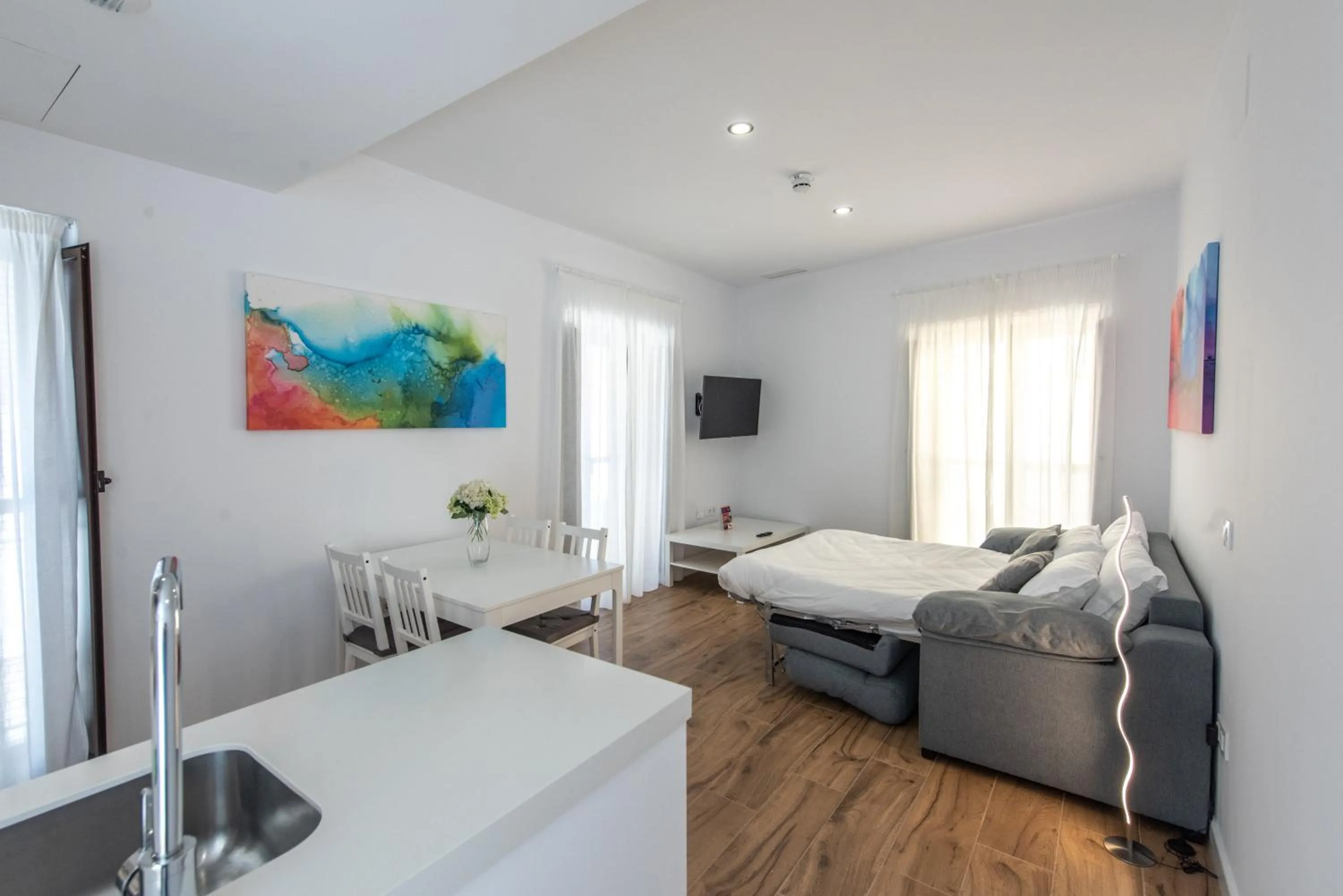 Living room, Bed in Apartamentos Santa María 15