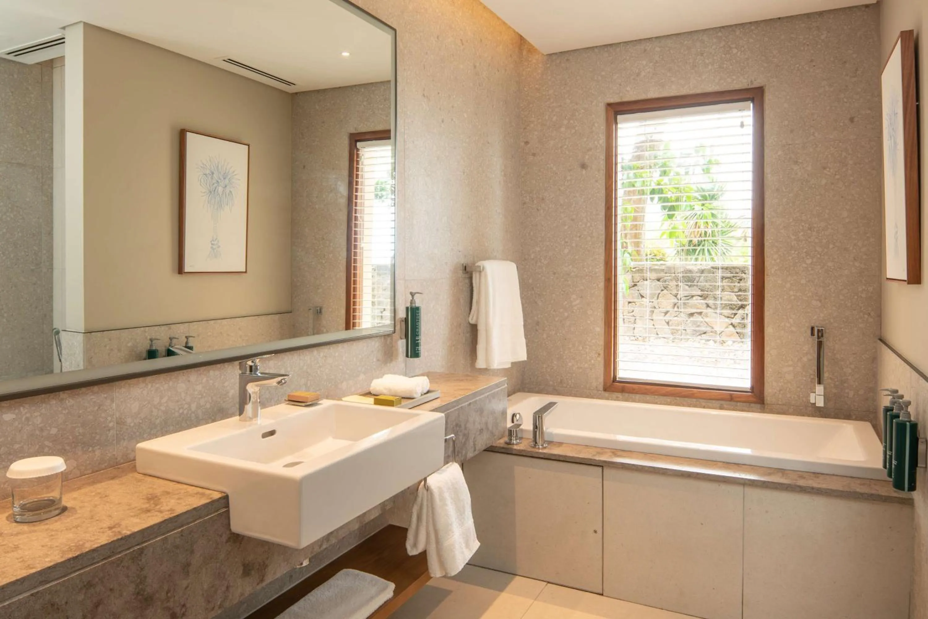 Bathroom in Hilton Mauritius Resort & Spa