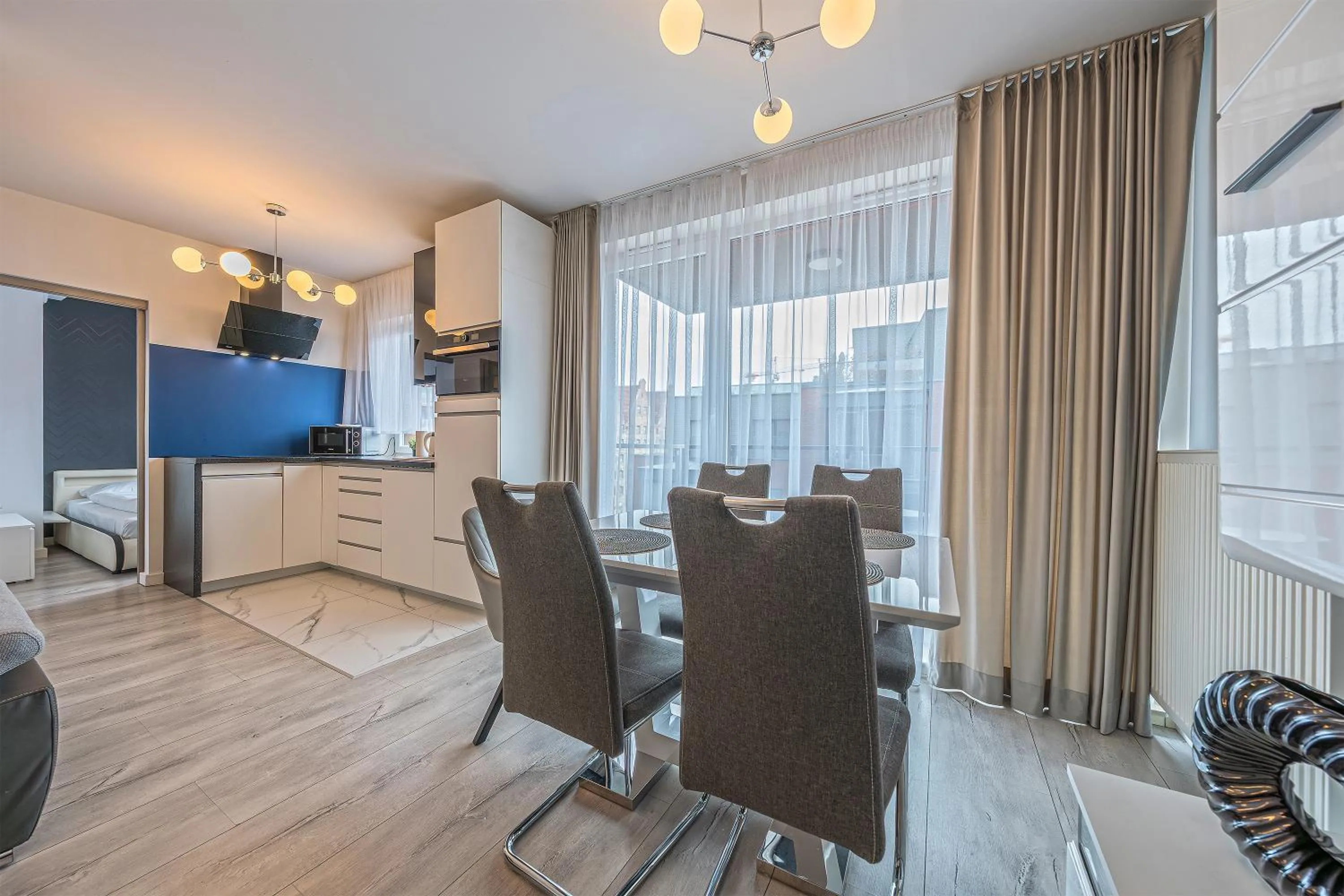 Kitchen or kitchenette in Chmielna Park by Comfort Apartments