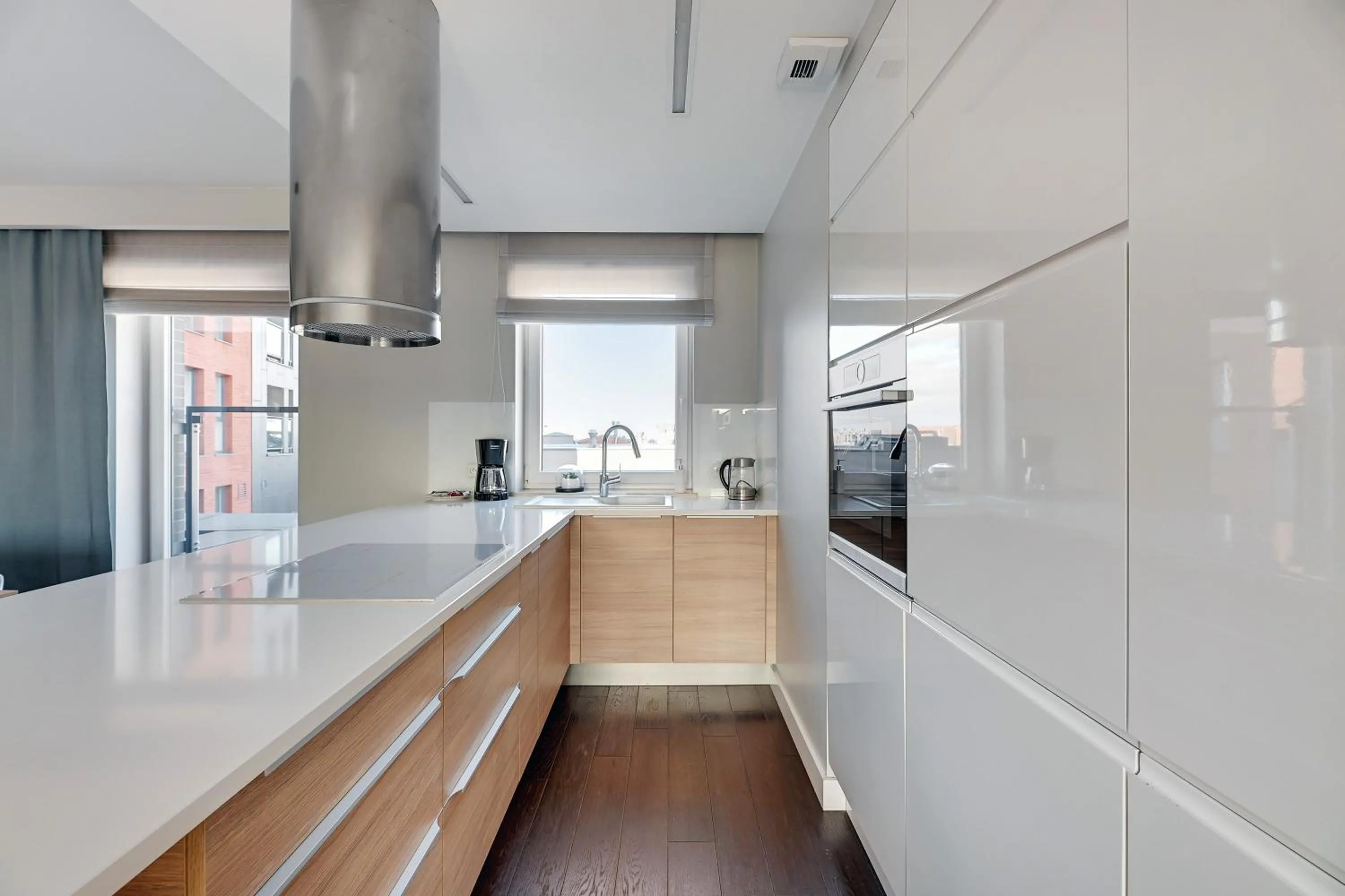 Kitchen or kitchenette in Chmielna Park by Comfort Apartments