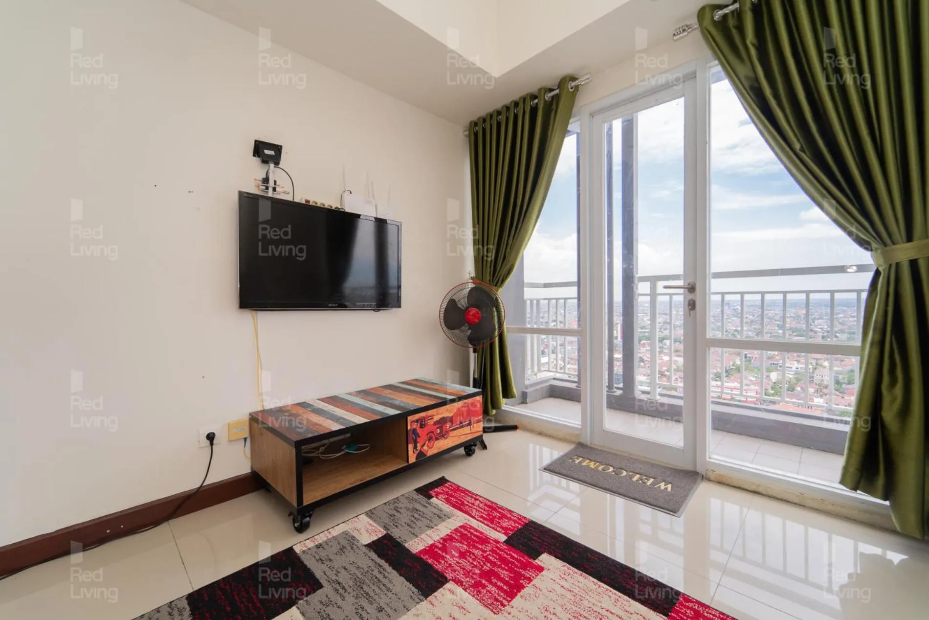 TV and multimedia, Bed in RedLiving Apartemen Vida View - Vida Connect