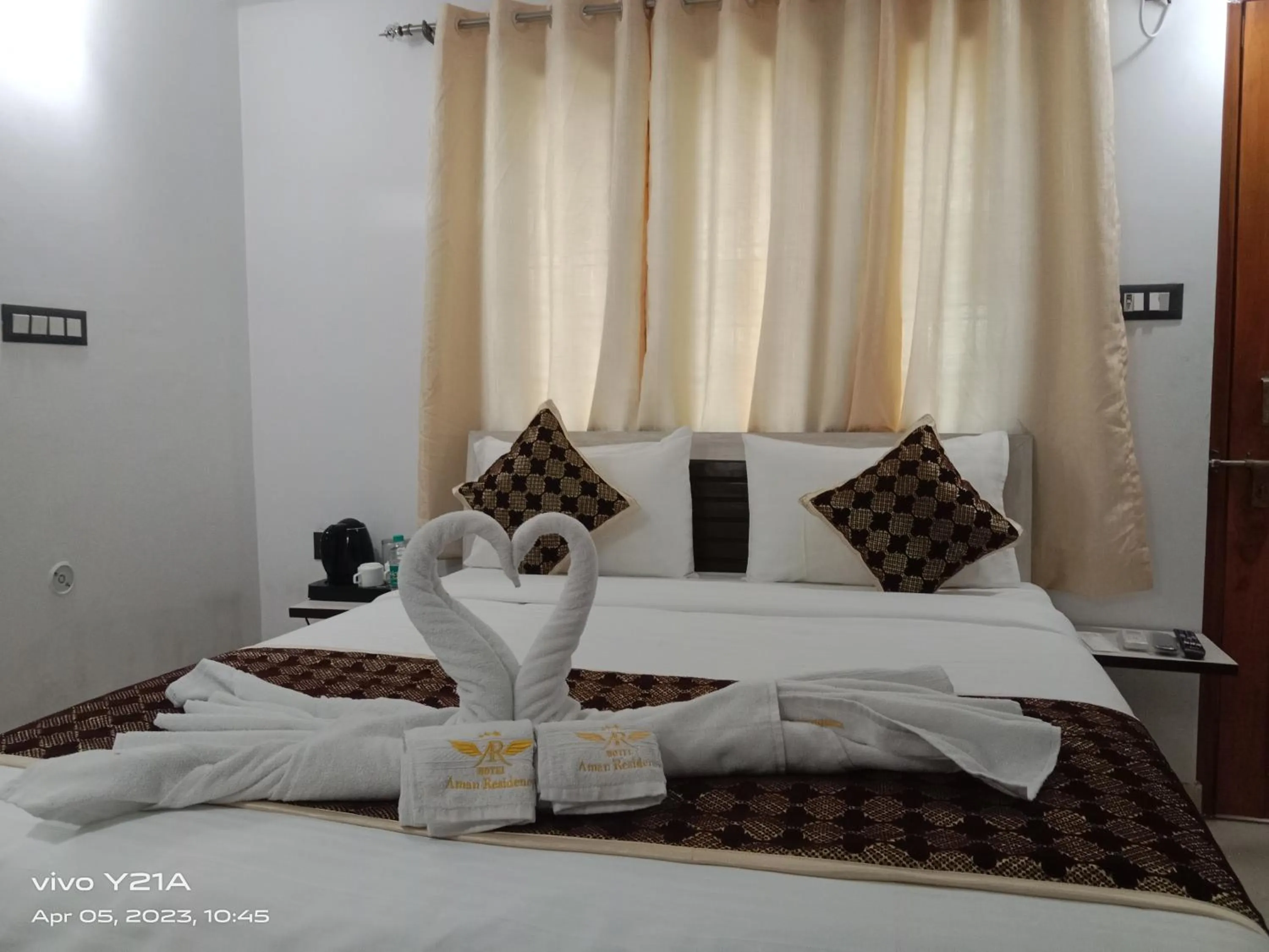 Bed in Hotel Aman Residency