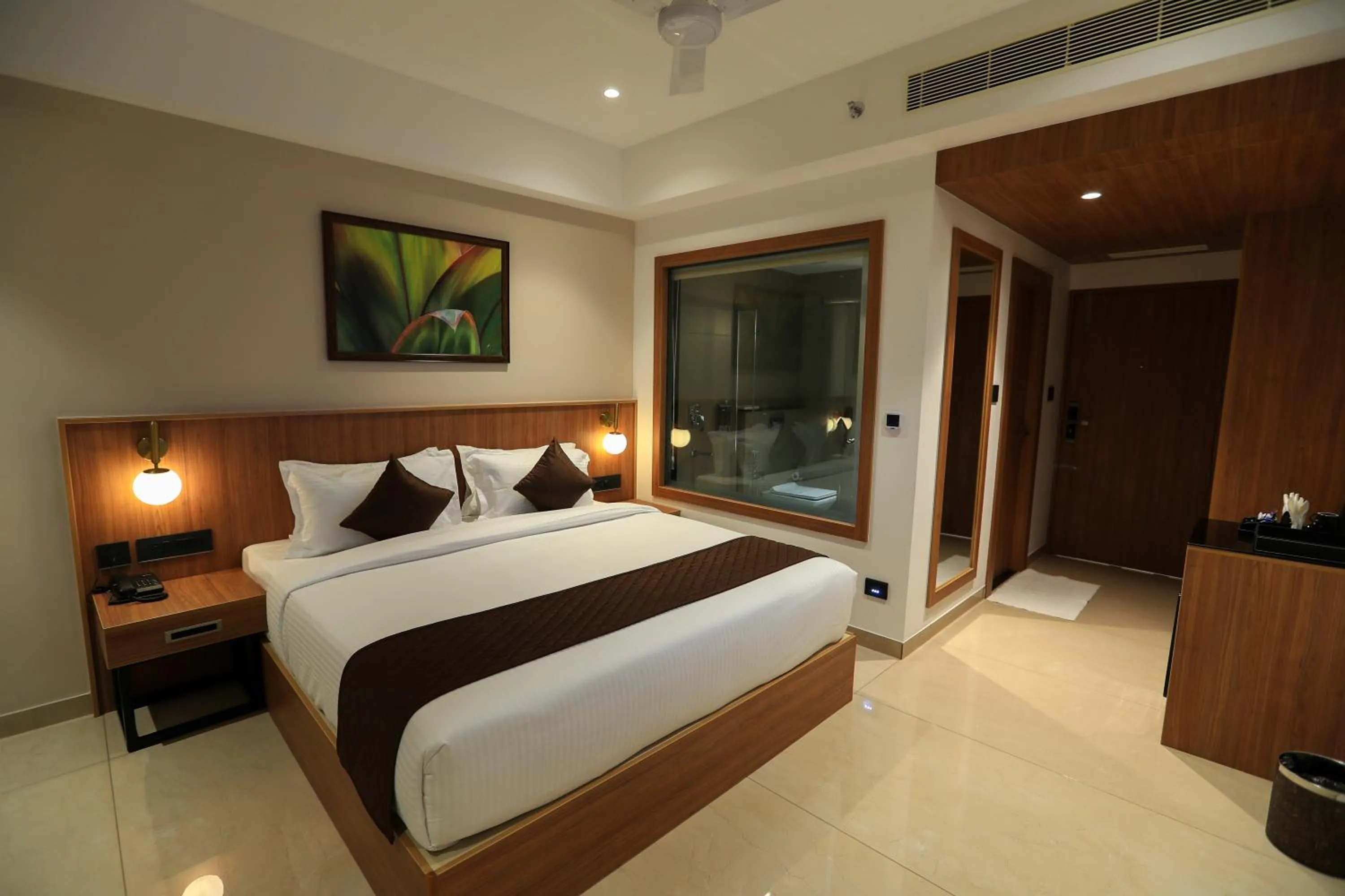 Photo of the whole room, Bed in Hotel Saffron Wayanad