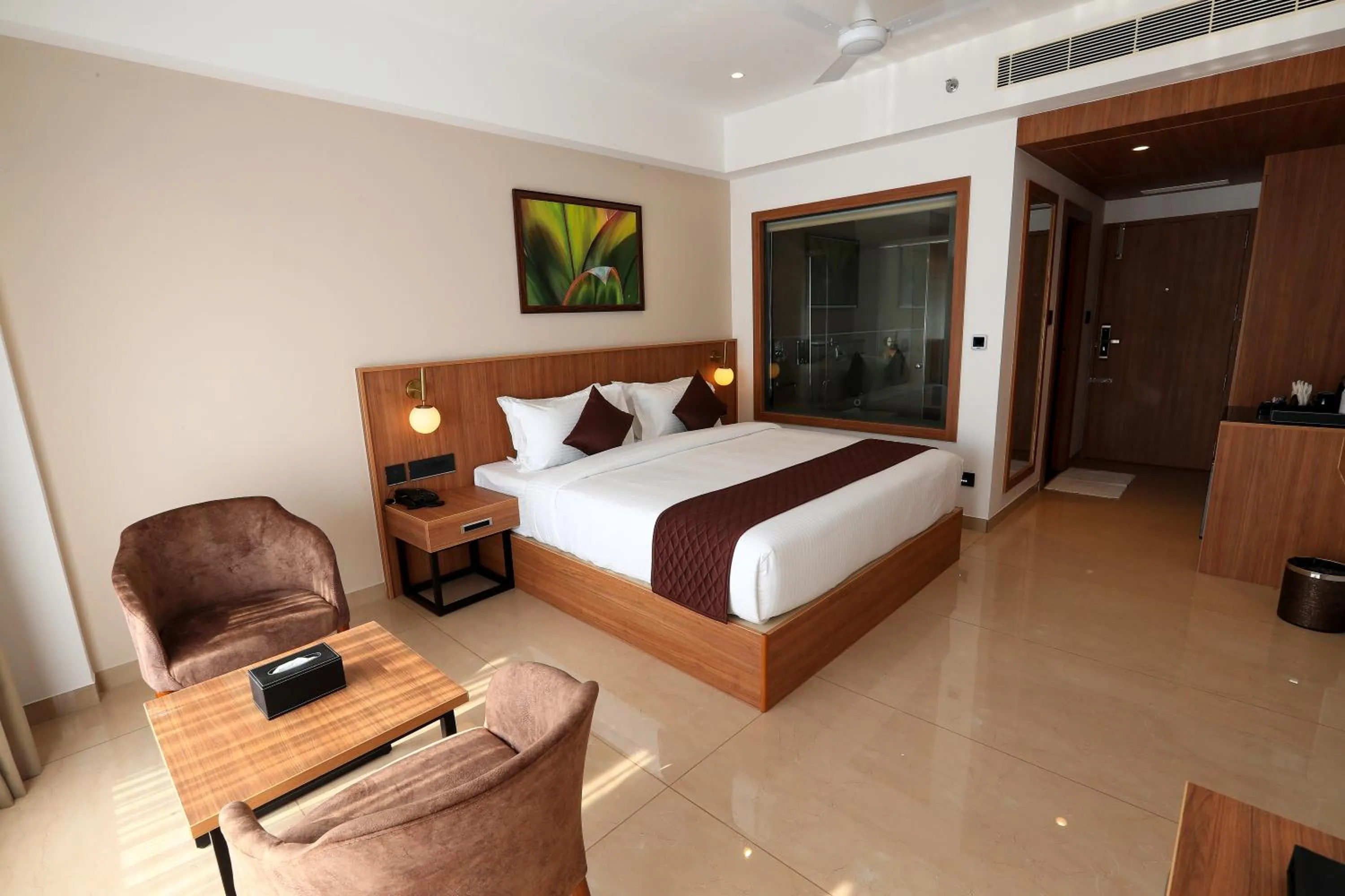 Photo of the whole room, Bed in Hotel Saffron Wayanad