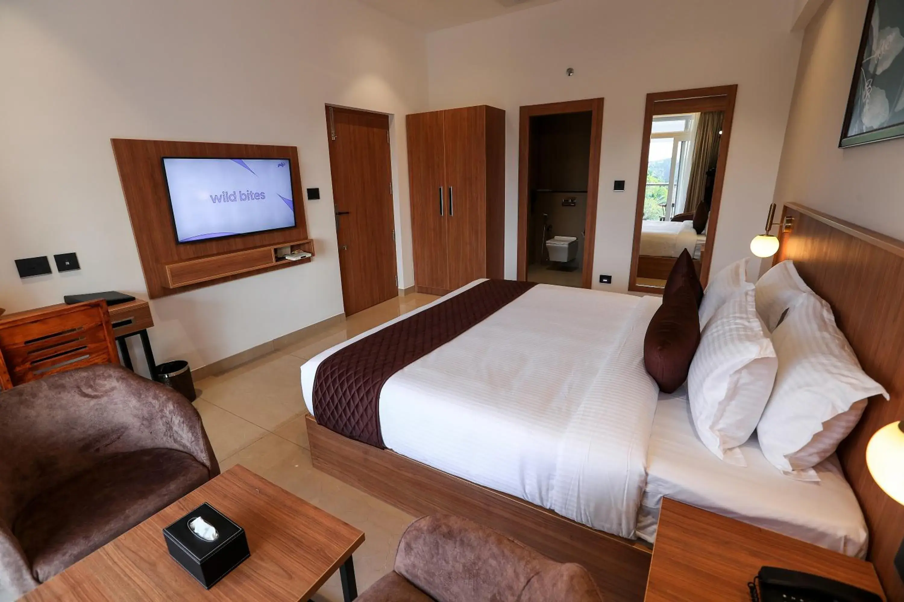 Bed in Hotel Saffron Wayanad Bed in Hotel Saffron Wayanad