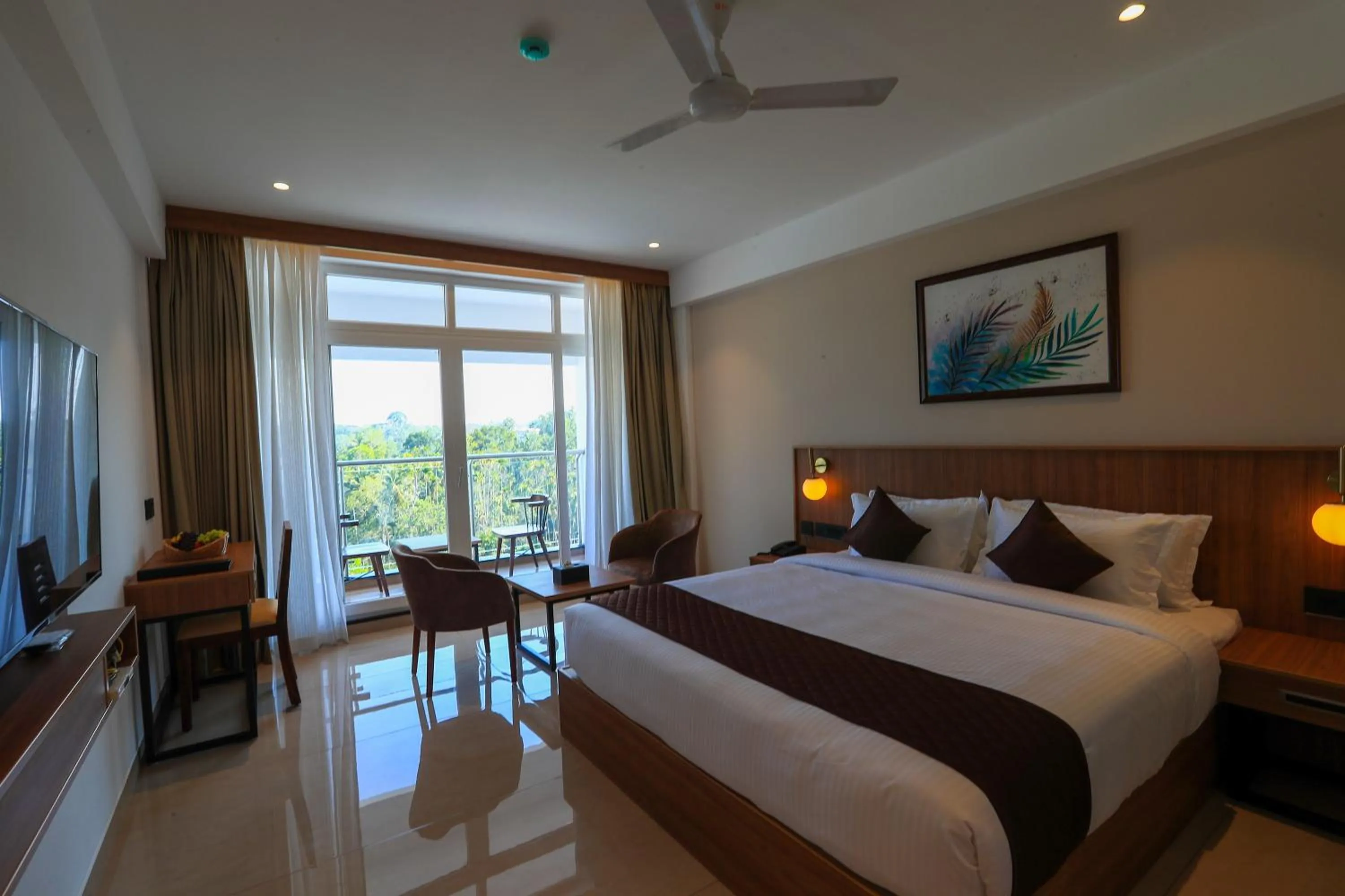 Photo of the whole room, Bed in Hotel Saffron Wayanad