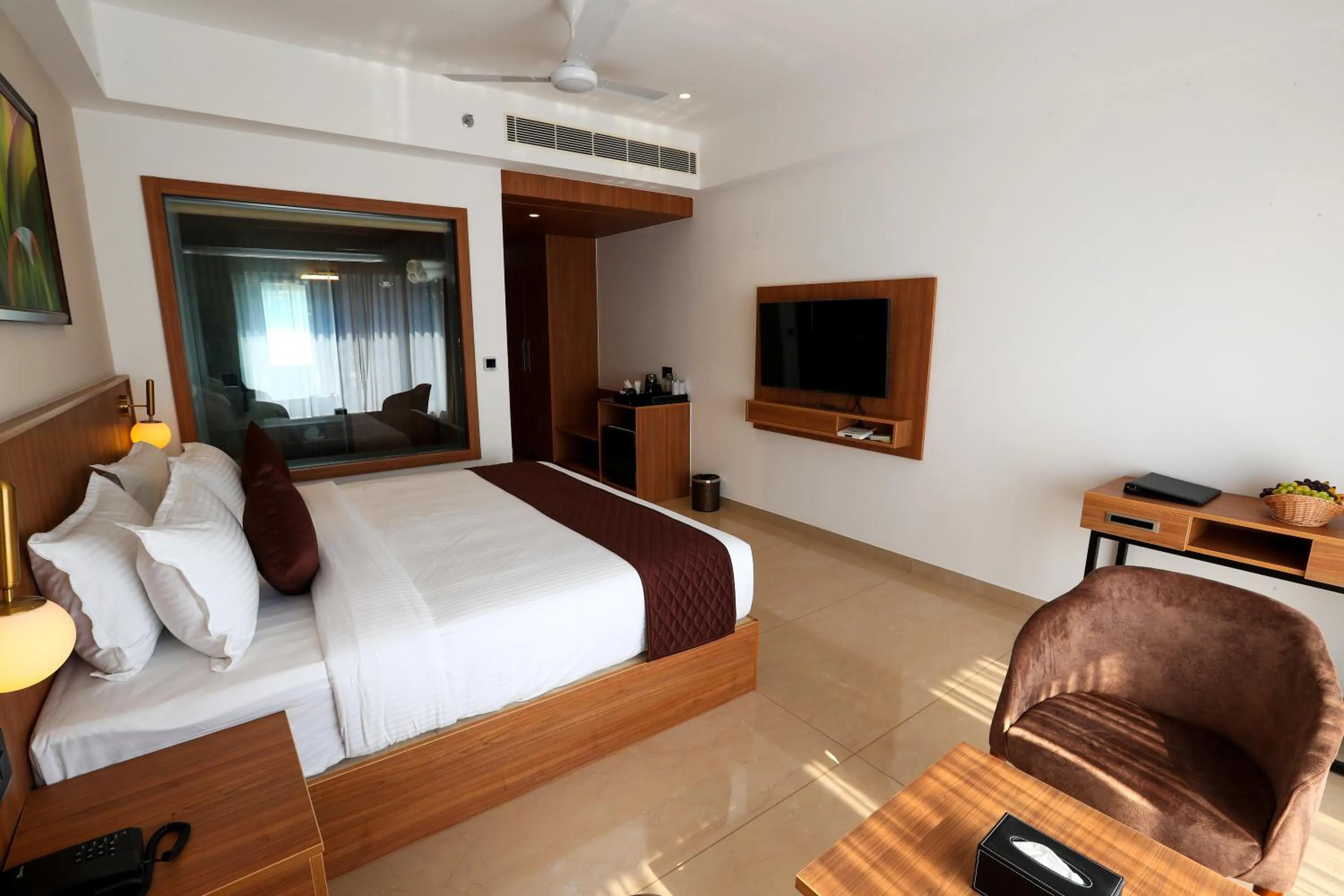 Photo of the whole room, Bed in Hotel Saffron Wayanad