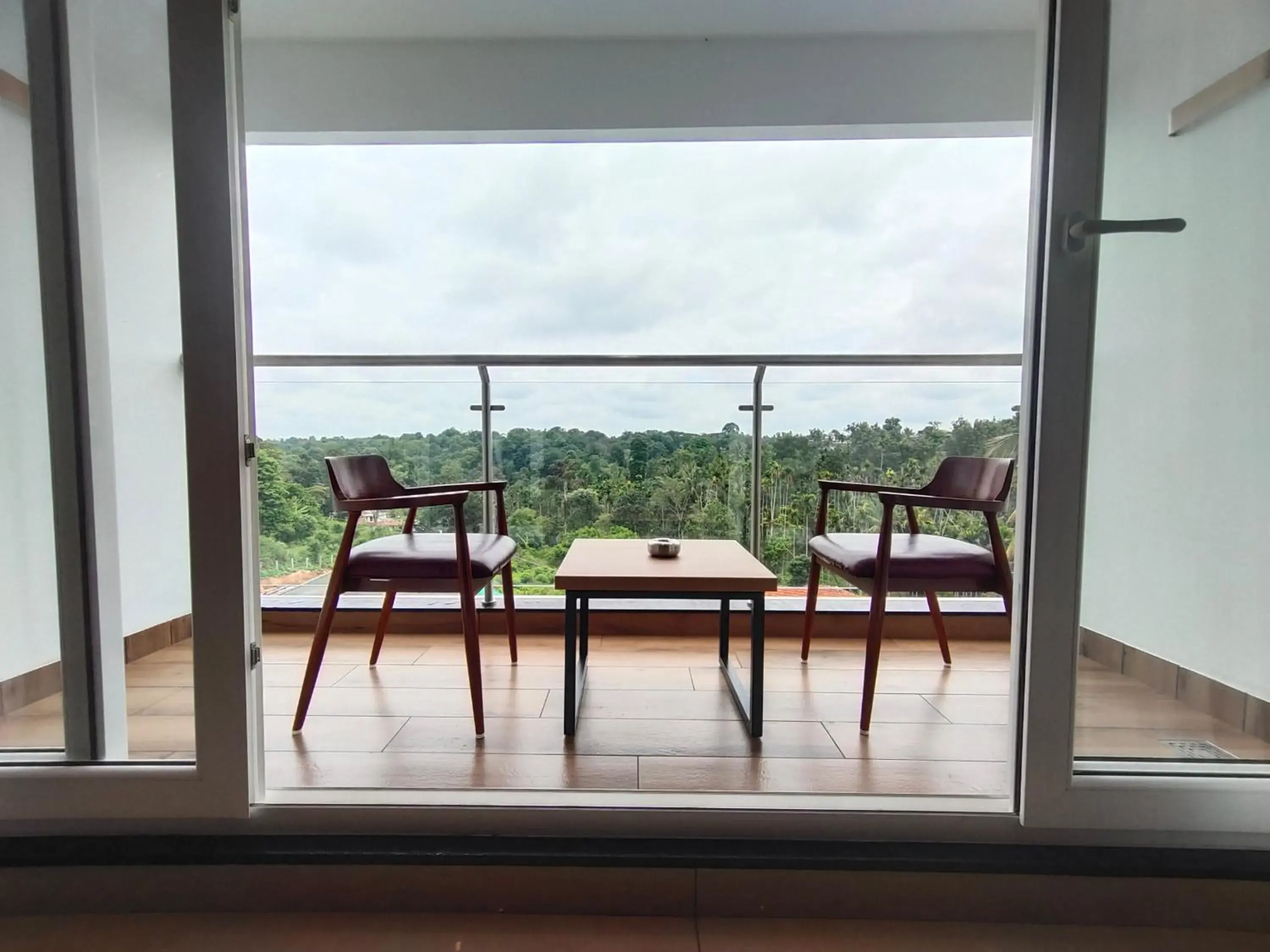 Balcony/Terrace in Hotel Saffron Wayanad Balcony/Terrace in Hotel Saffron Wayanad