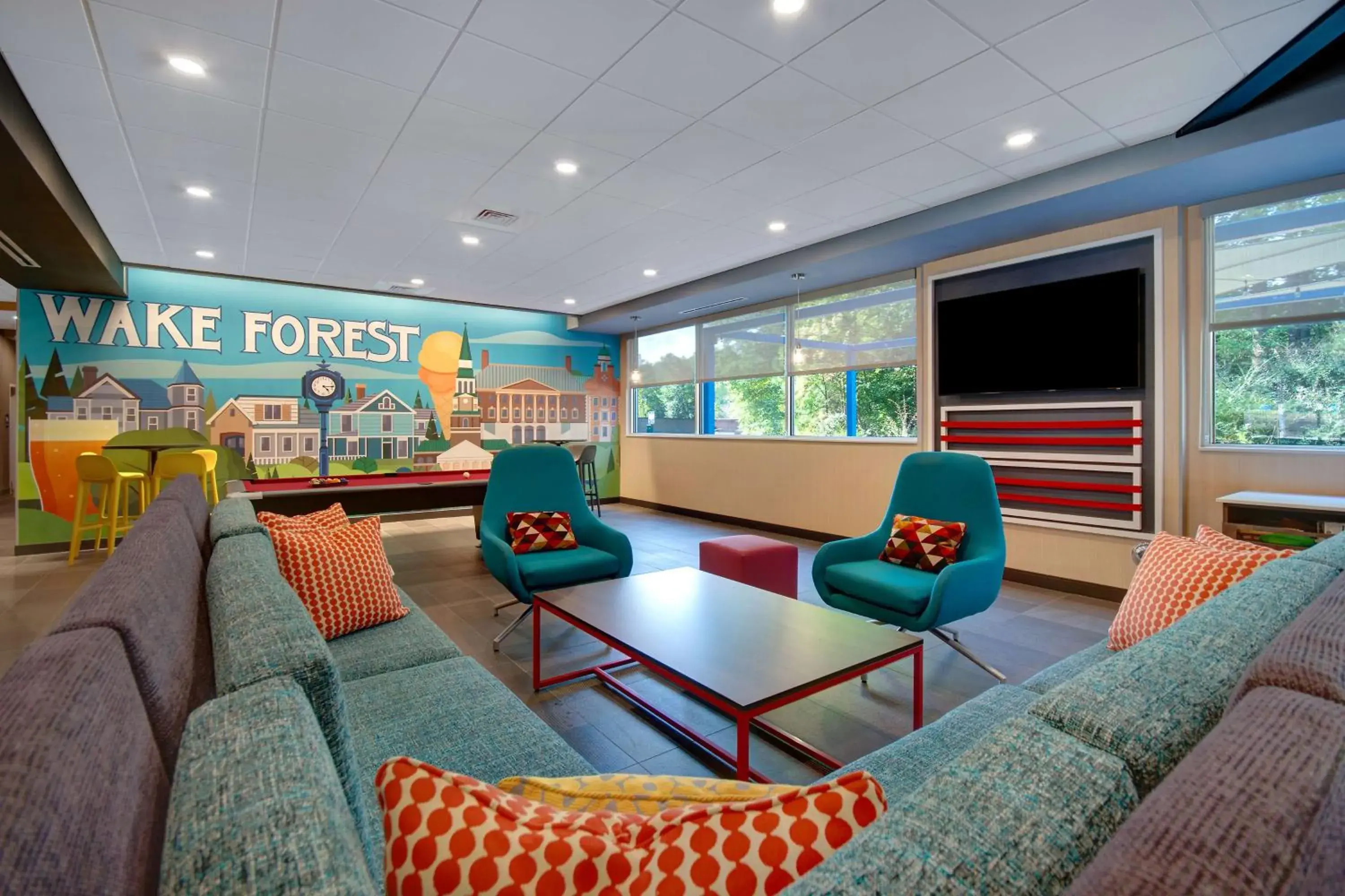 Lobby or reception in Tru By Hilton Wake Forest Raleigh North Lobby or reception in Tru By Hilton Wake Forest Raleigh North