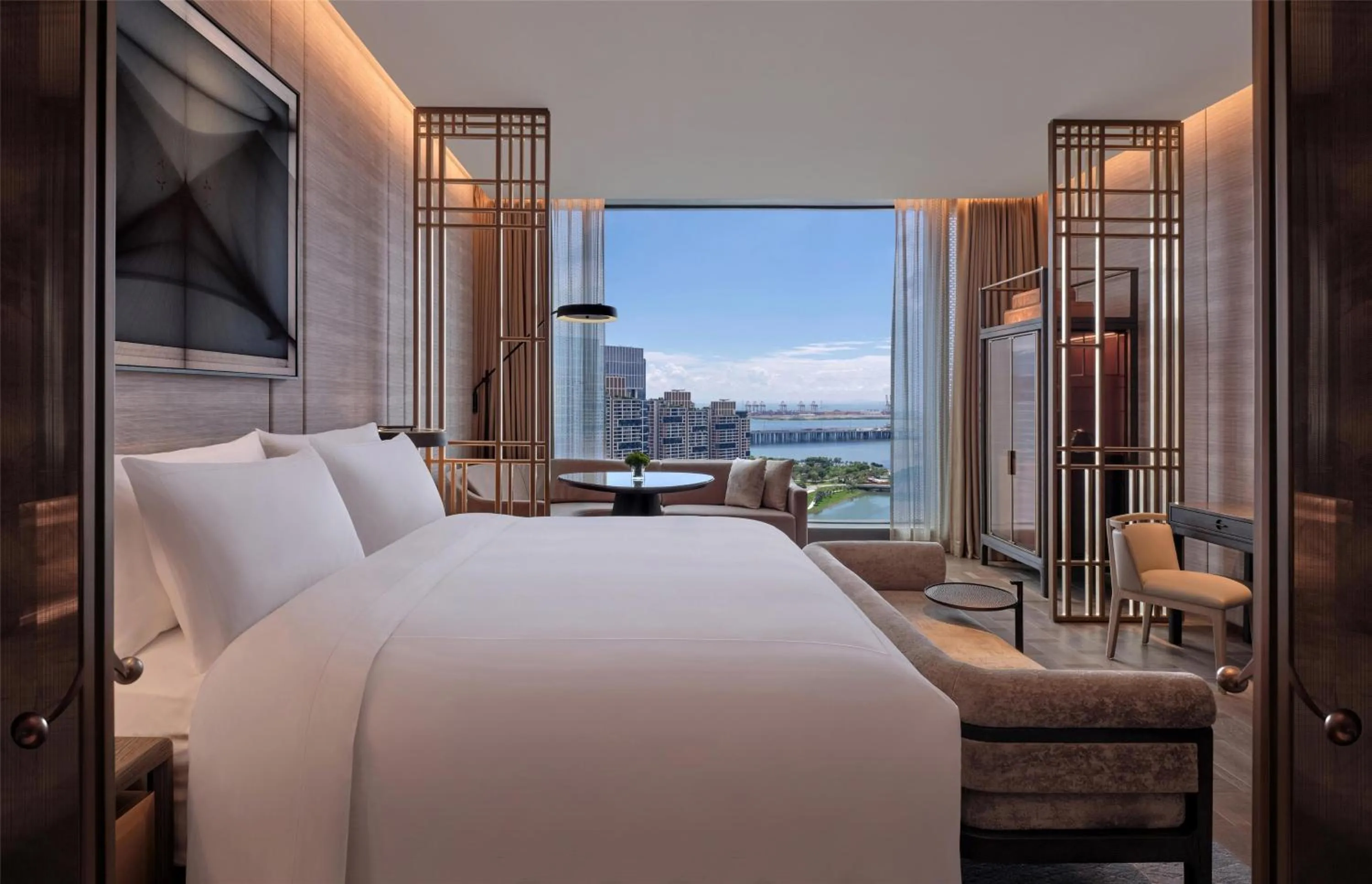 View (from property/room), Bed in Conrad Shenzhen, the first art museum hotel in Greater Bay Area with the stunning bay and sunset view in the hotel terrace