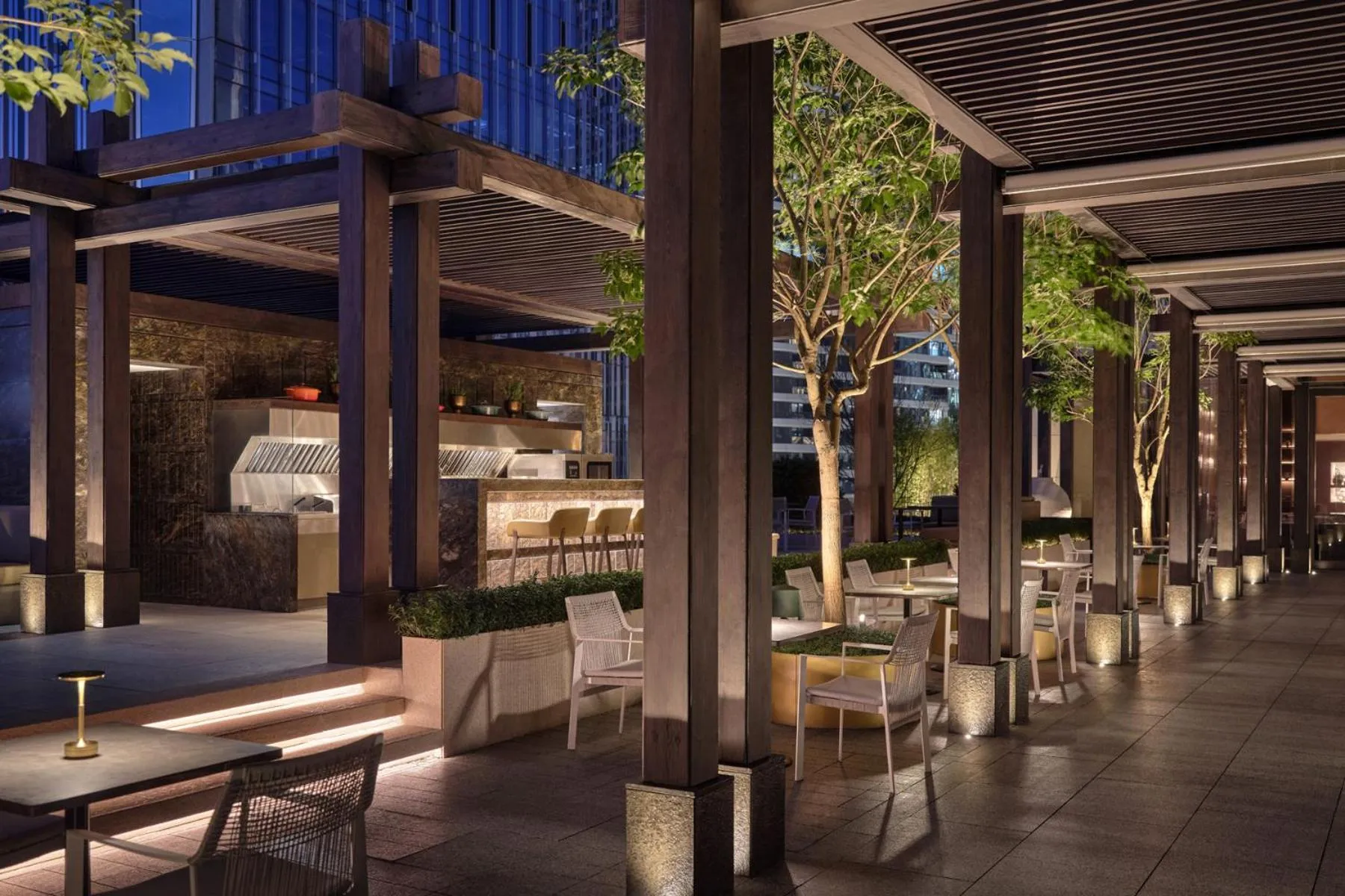 Lounge or bar in Conrad Shenzhen, the first art museum hotel in Greater Bay Area with the stunning bay and sunset view in the hotel terrace