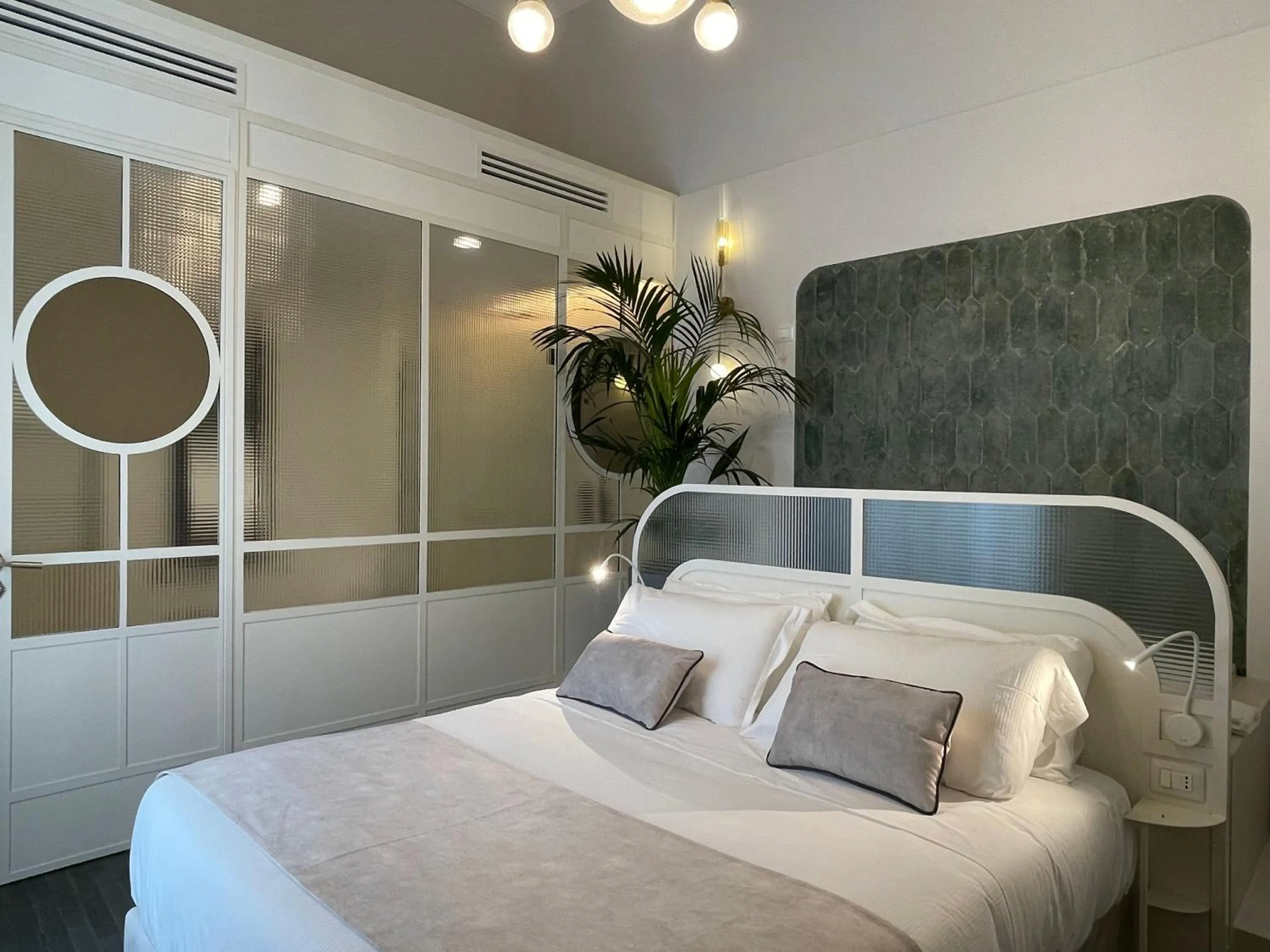 Photo of the whole room, Bed in Artemisia Domus - Giardino