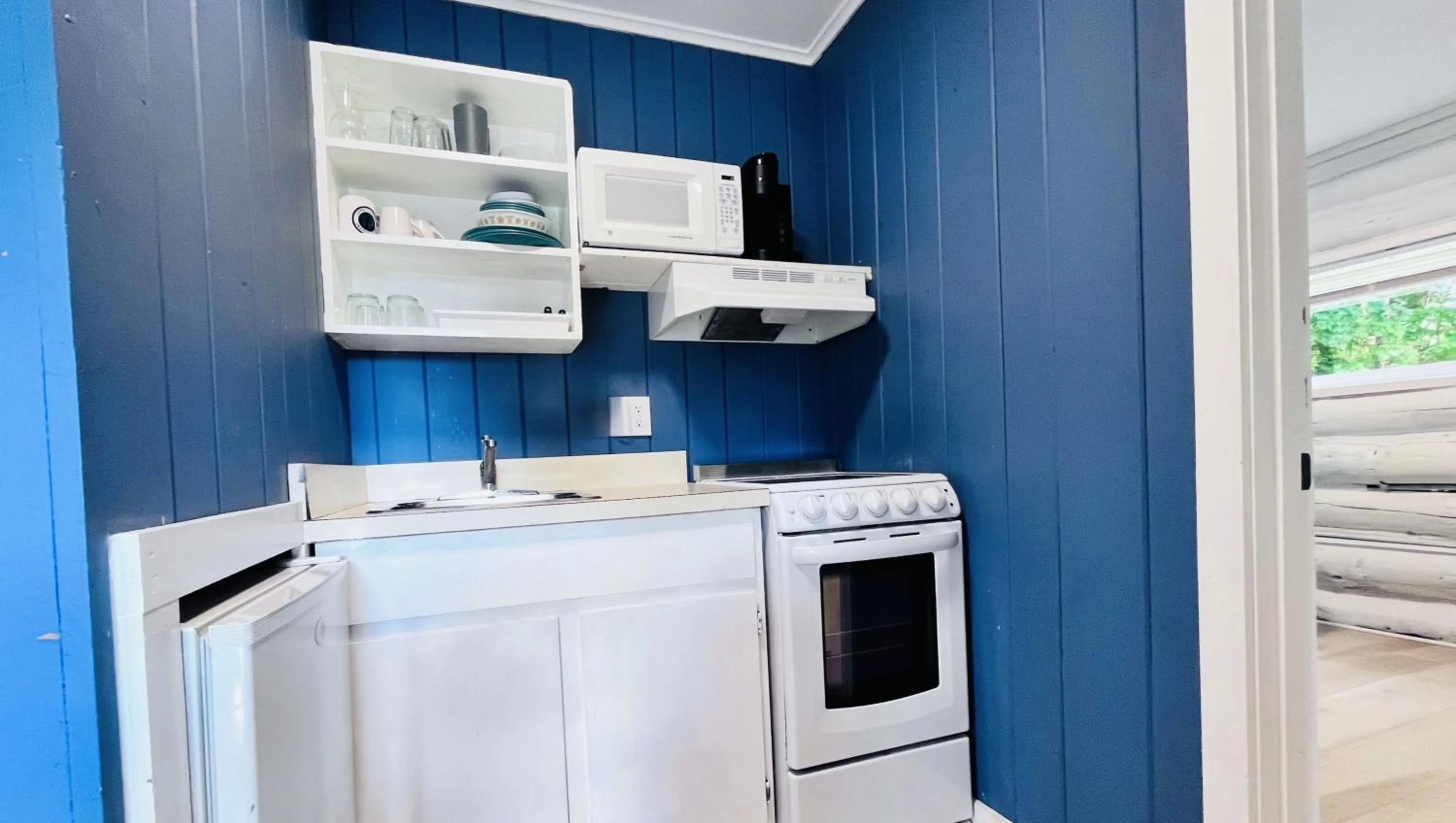 Kitchen or kitchenette in Motel Luzerne