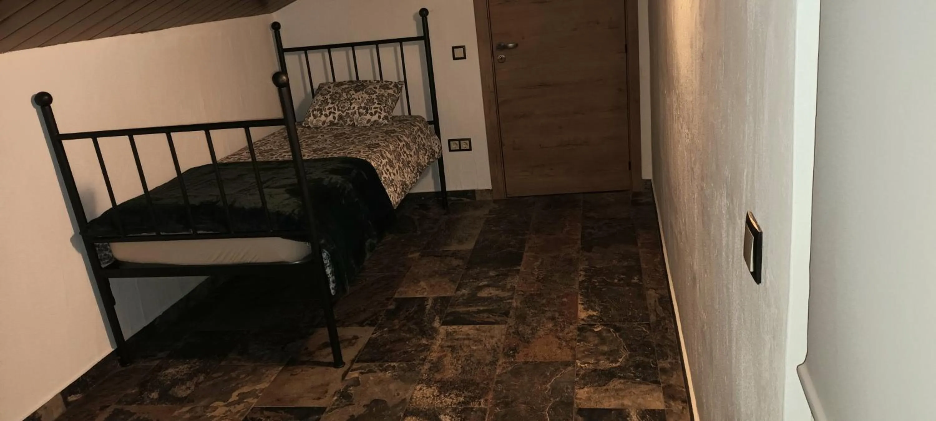 Bed in Aladin Comfort Country Rooms