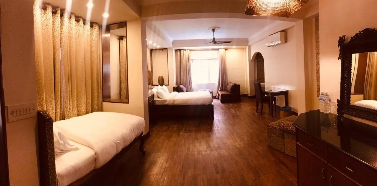 Bed in Courtyard Pujan Hotel