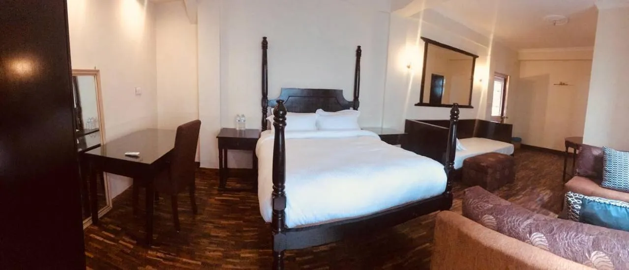 Bed in Courtyard Pujan Hotel