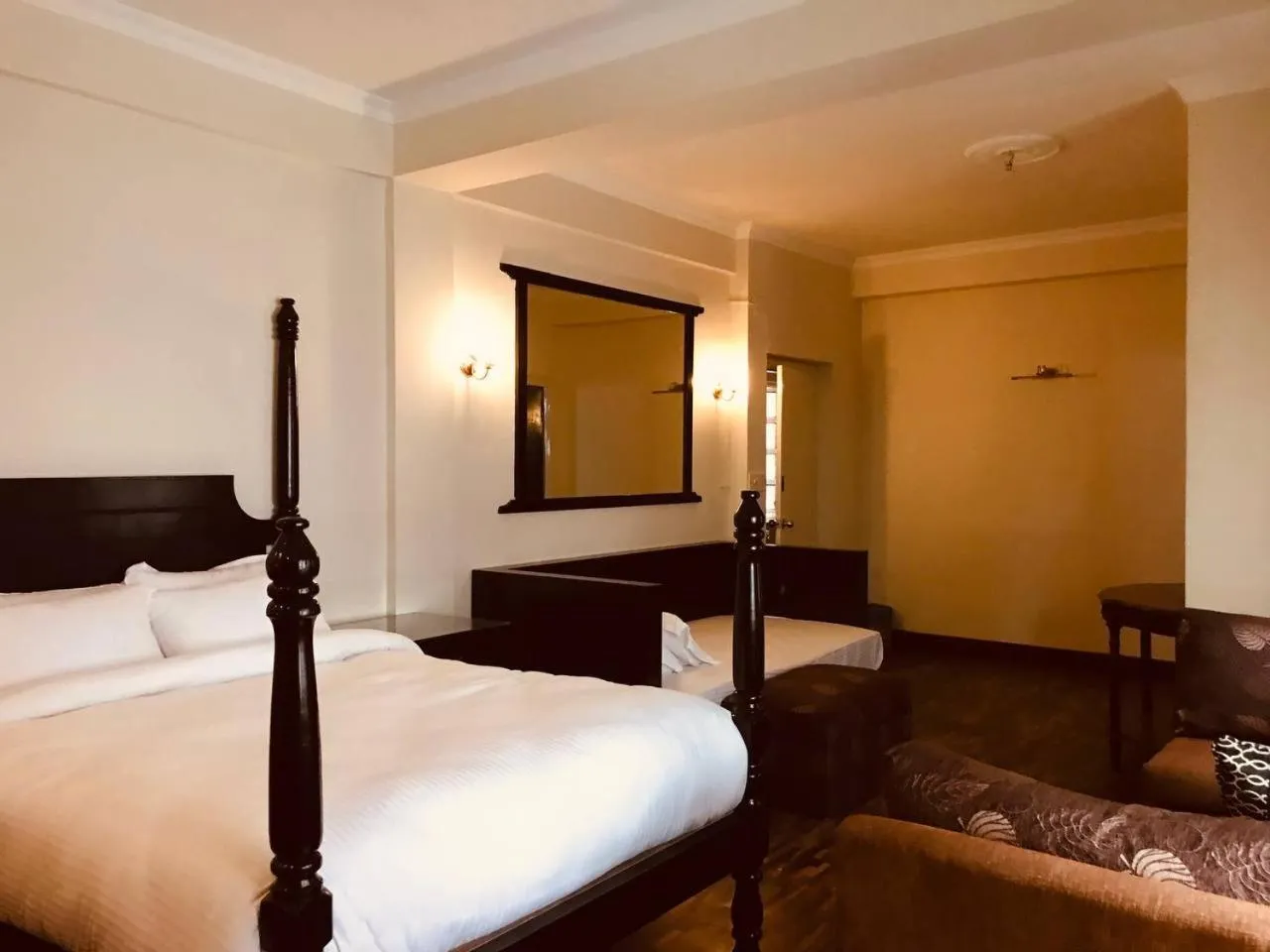 Bed in Courtyard Pujan Hotel