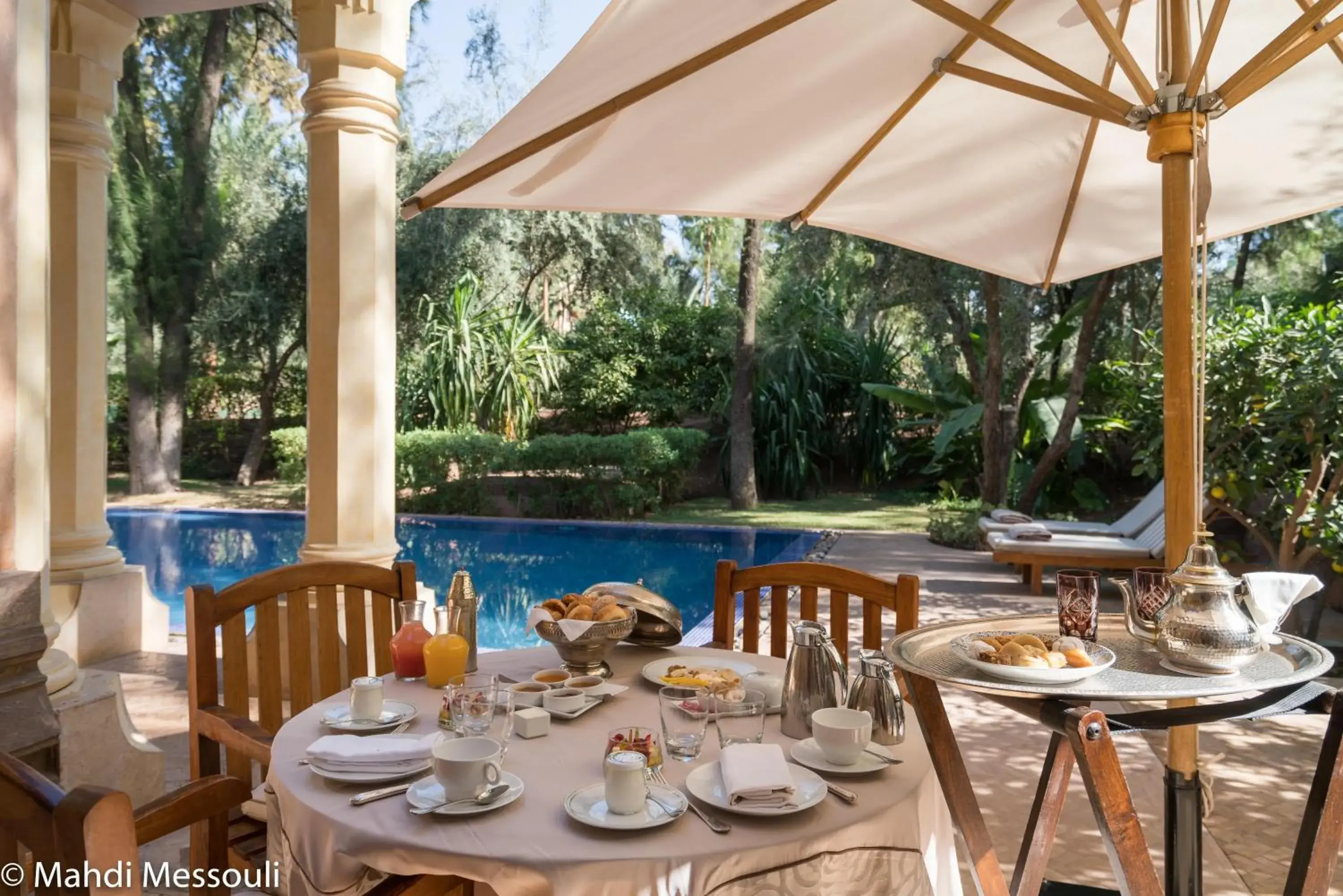 Swimming pool in Es Saadi Marrakech Resort - Palace Swimming pool in Es Saadi Marrakech Resort - Palace