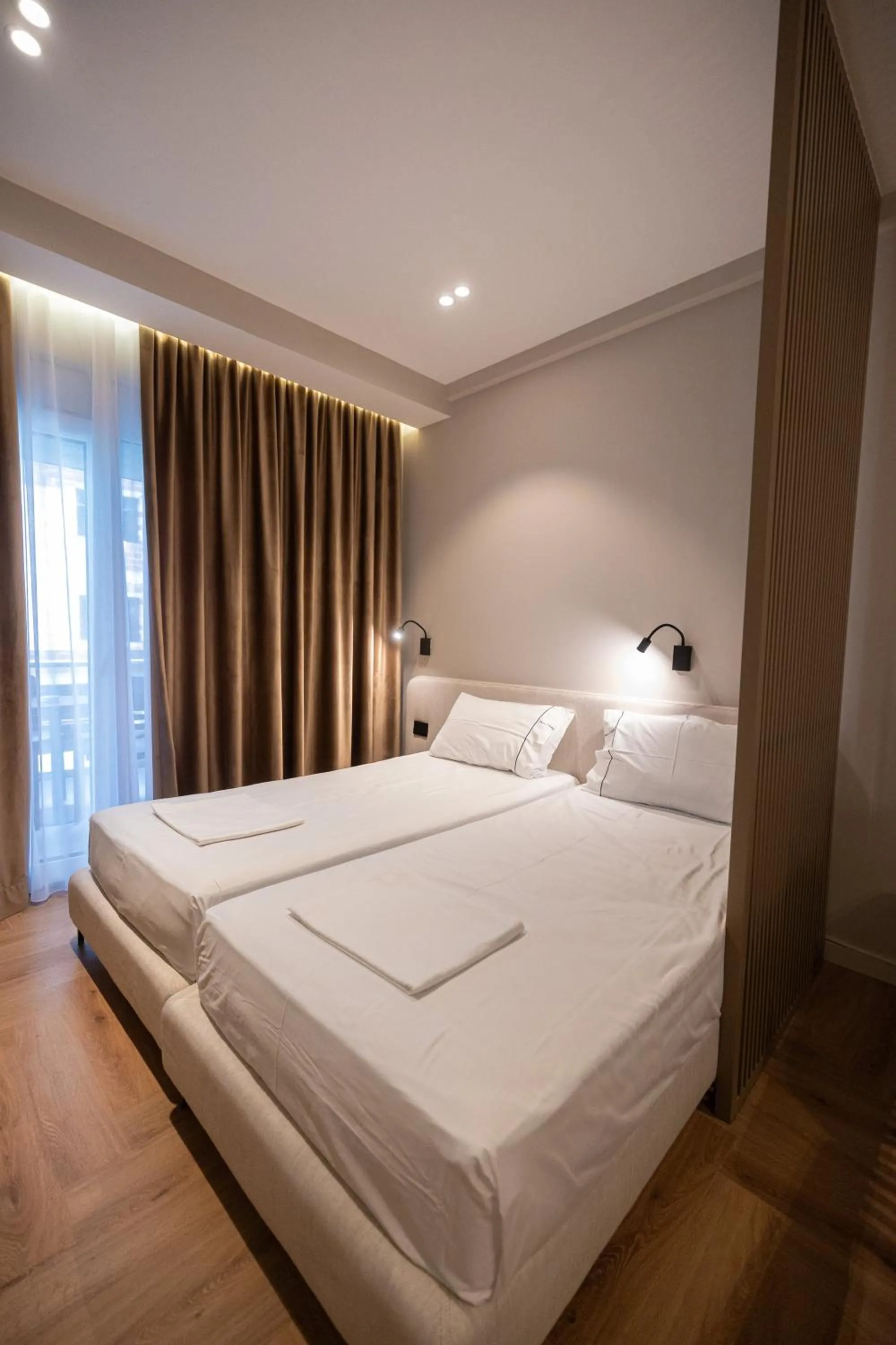 Bed in Miramare Apartments