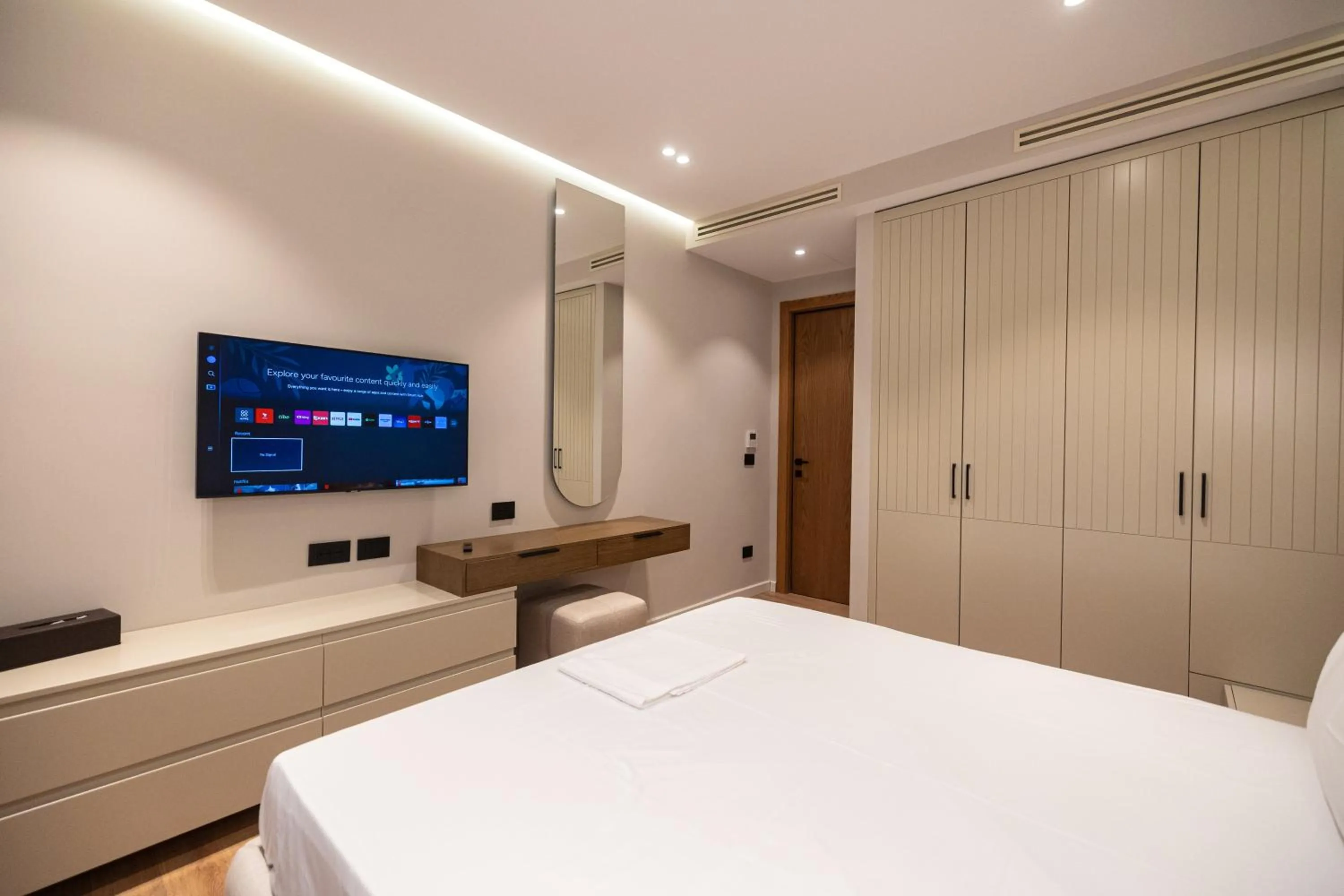 Bed in Miramare Apartments