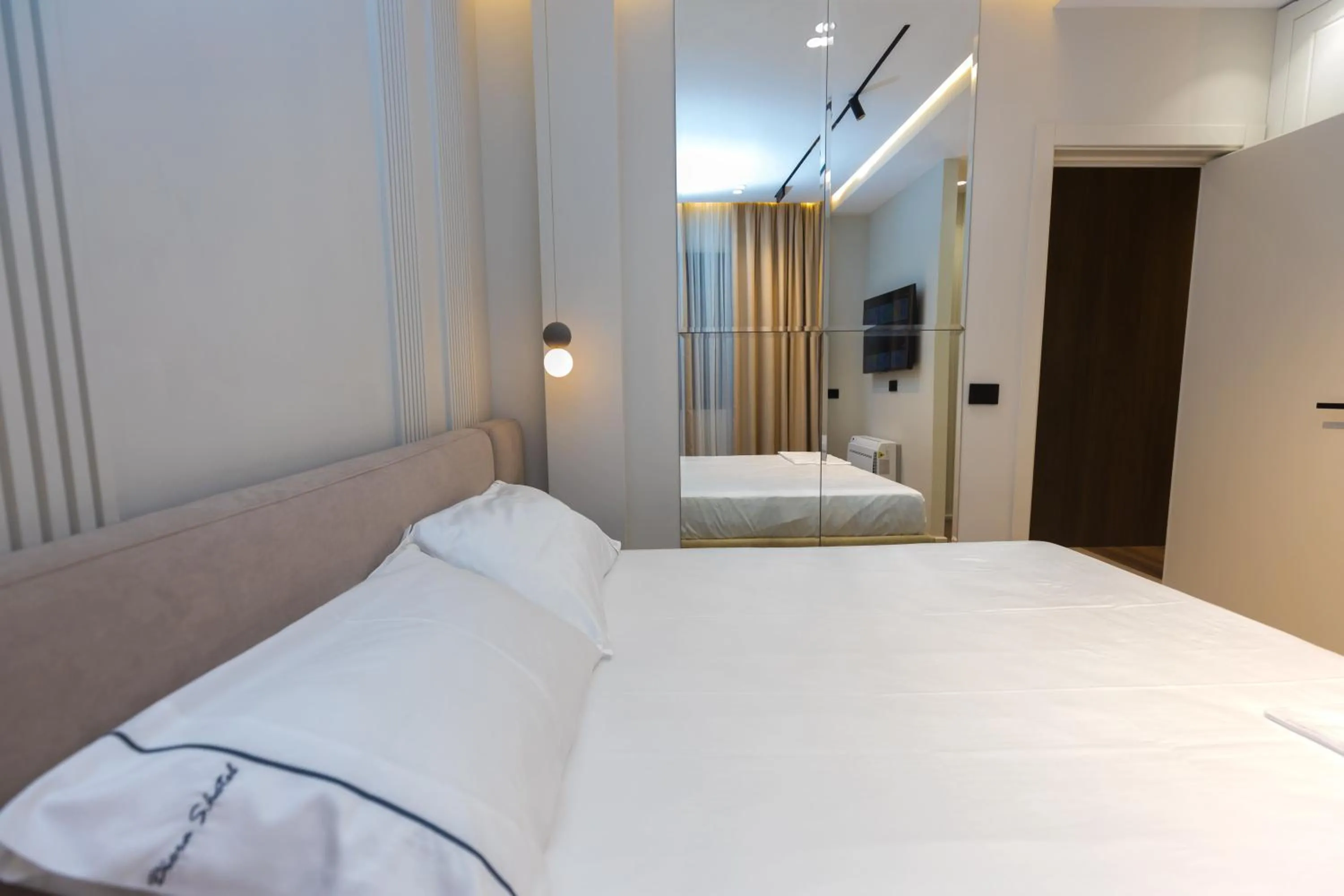Bed in Miramare Apartments