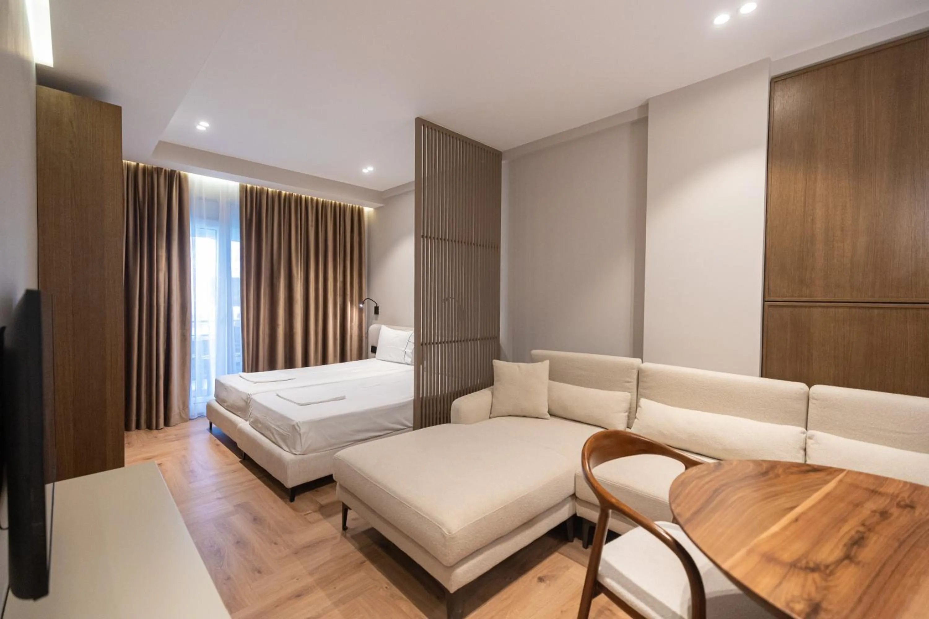 Bed in Miramare Apartments