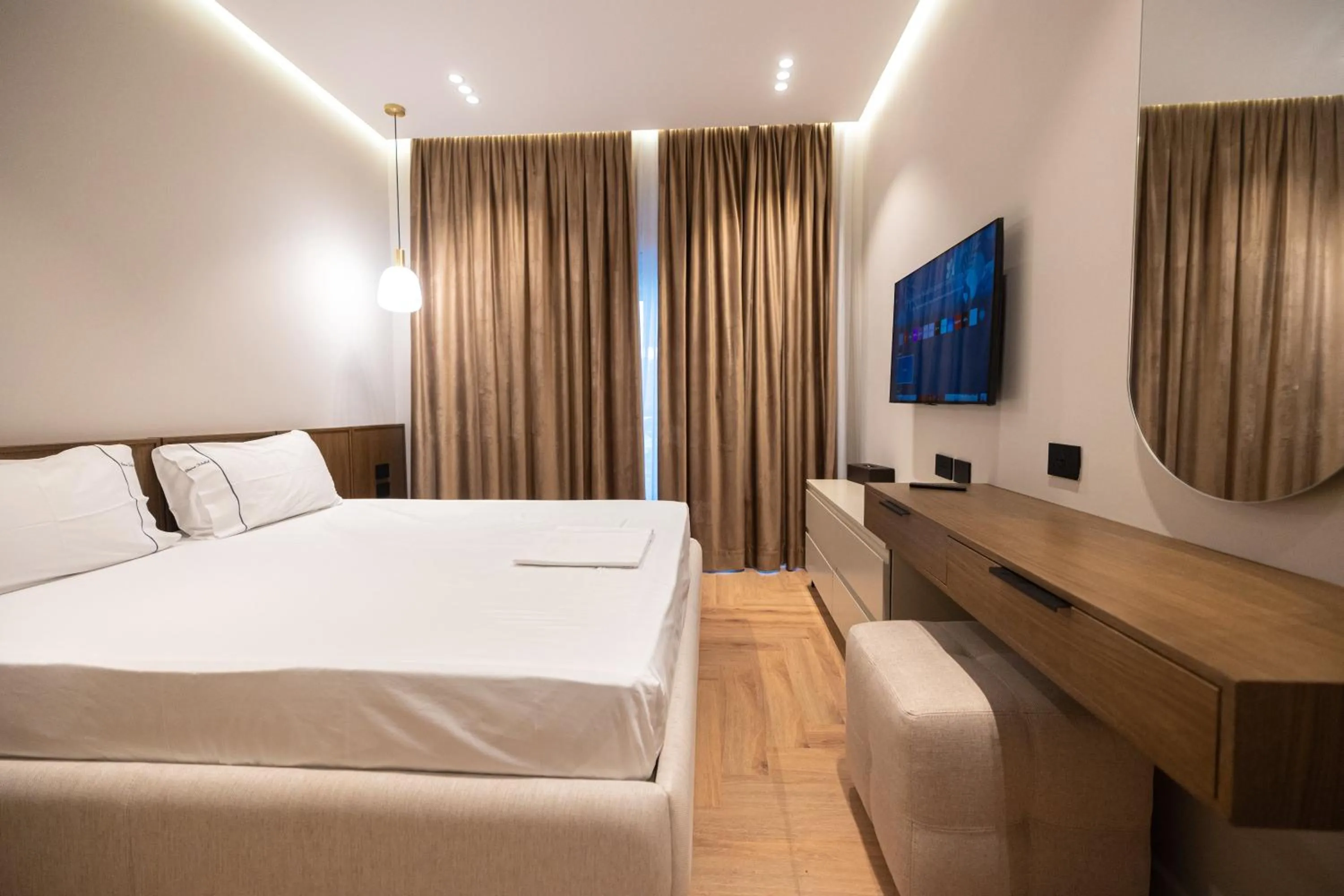 Bed in Miramare Apartments
