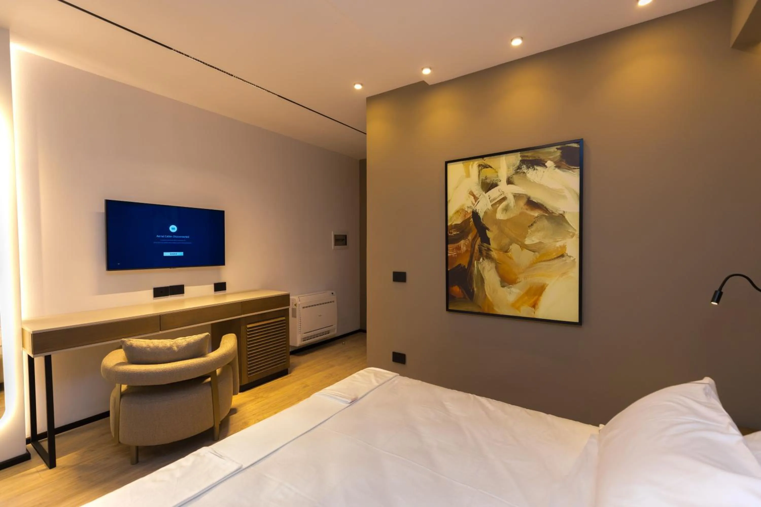 Bed in Miramare Apartments
