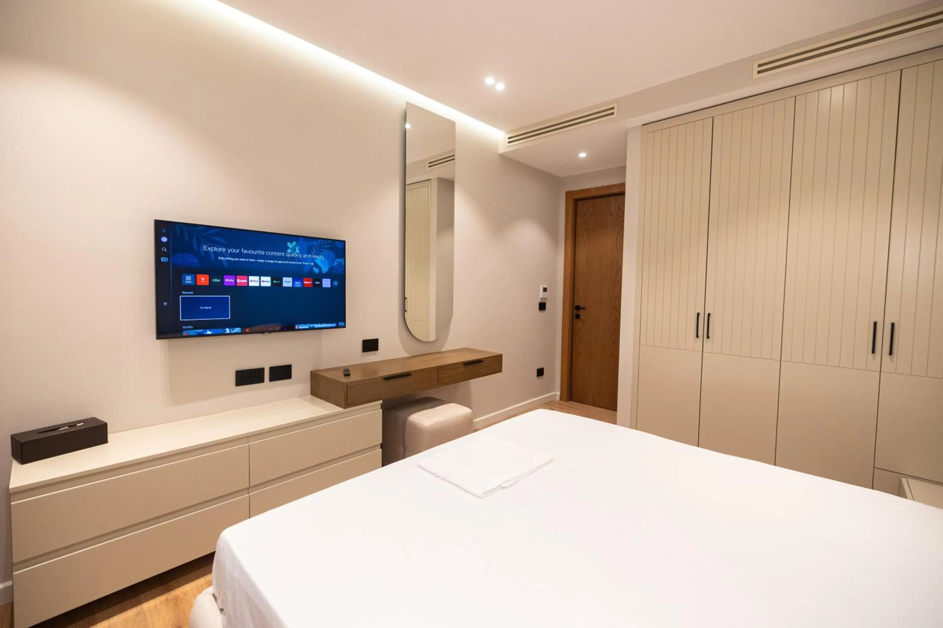 Bed in Miramare Apartments