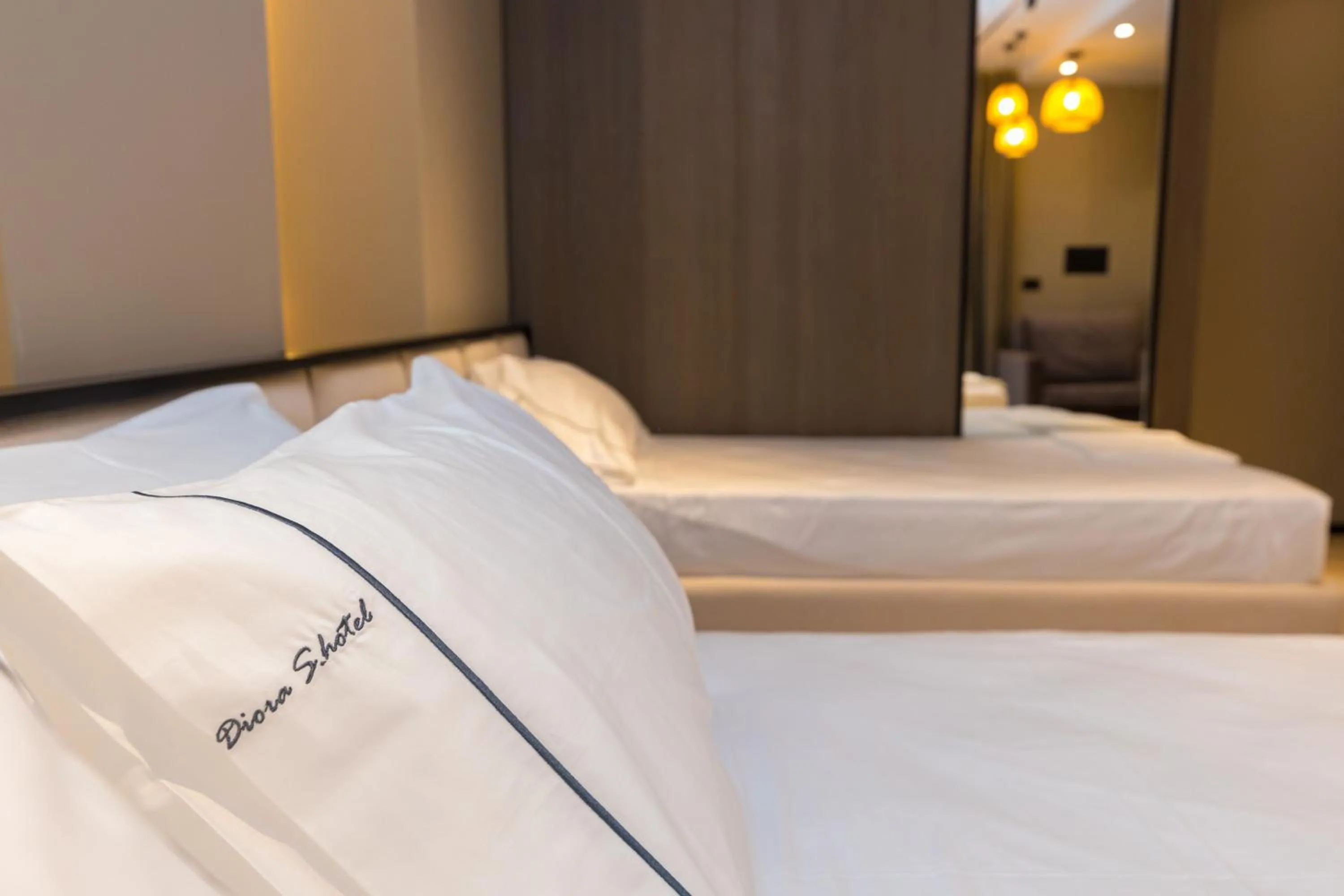 Bed in Miramare Apartments