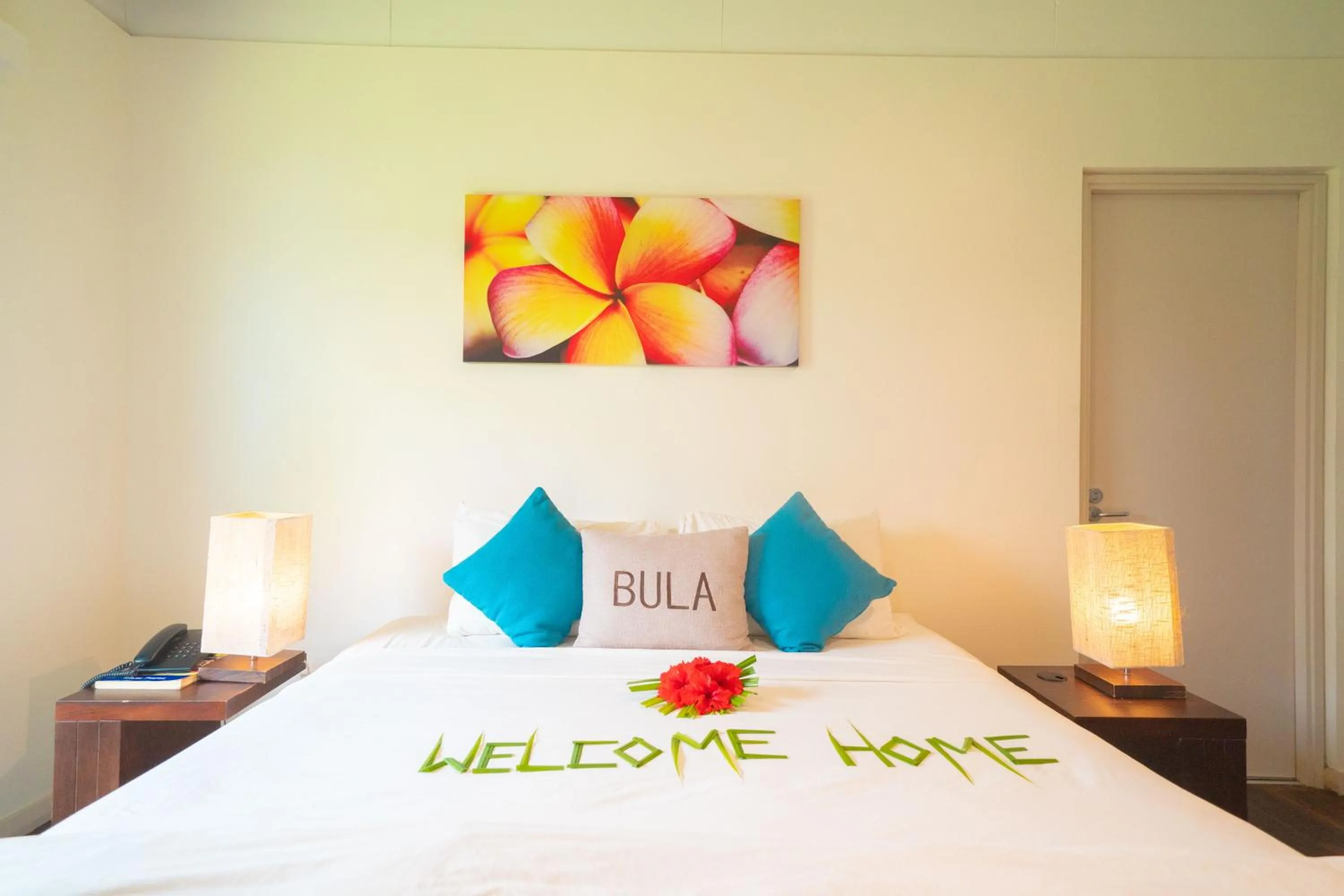 Bed in First Landing Beach Resort & Villas