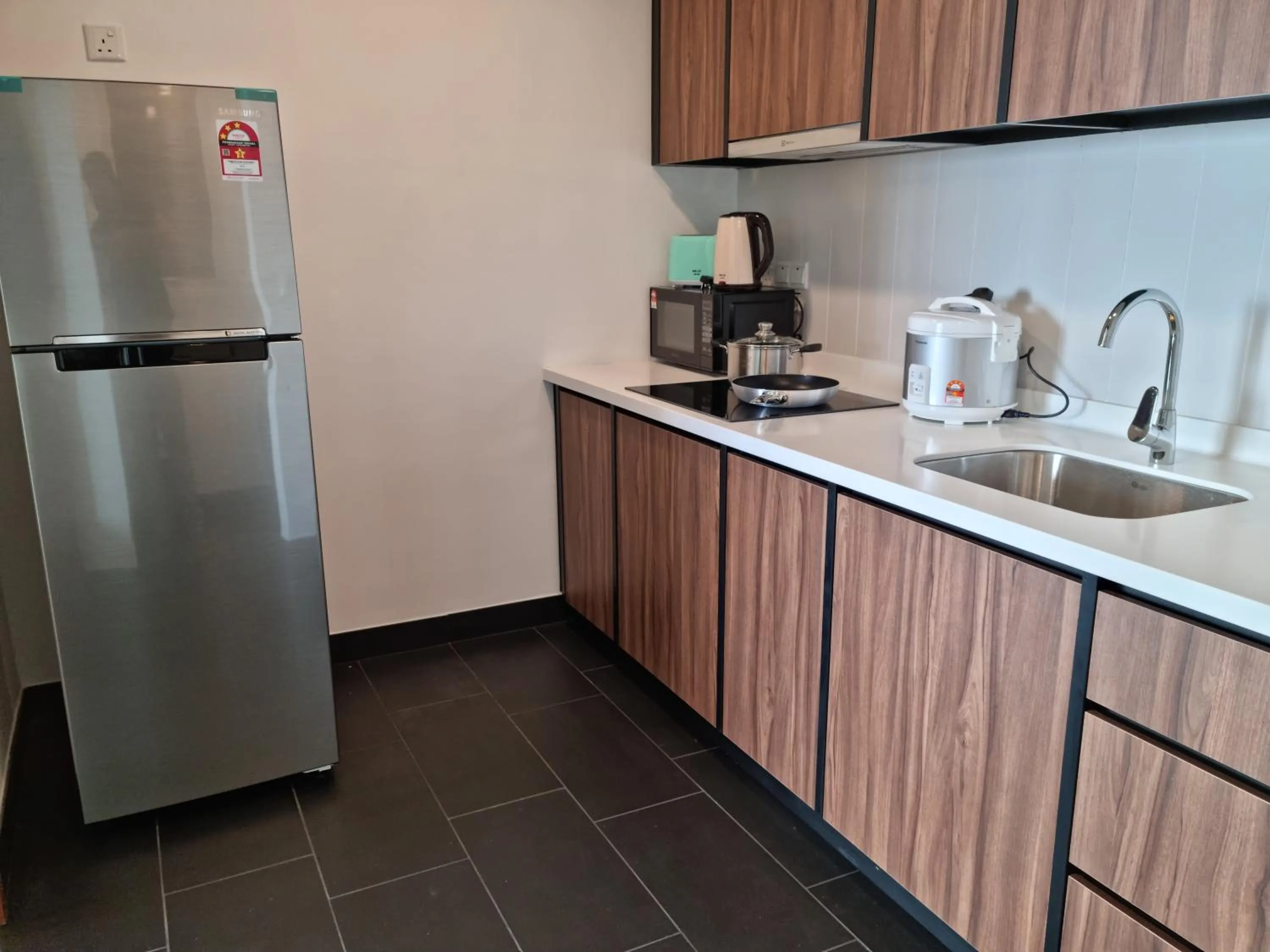 kitchen in Una Residence by Maya